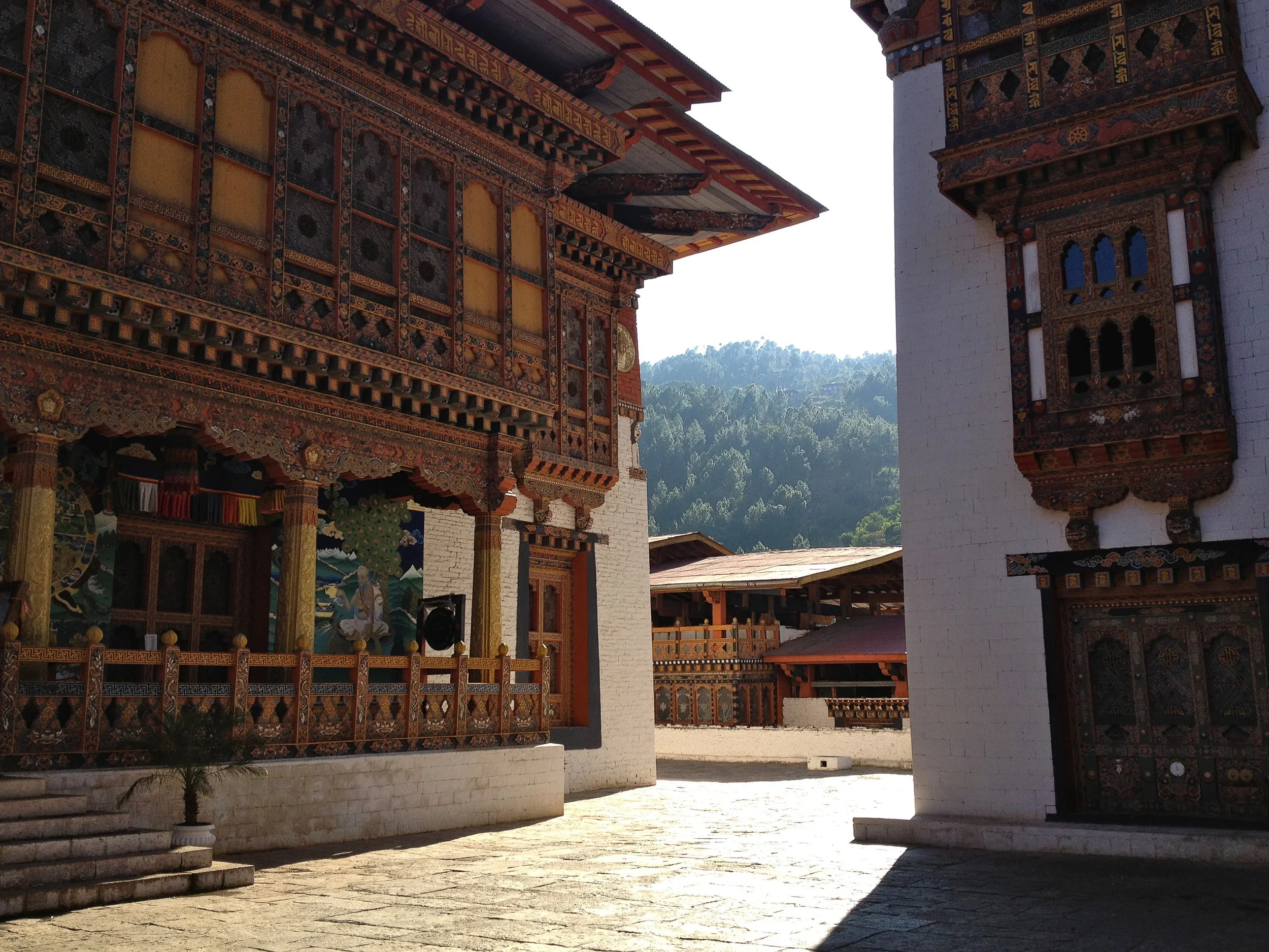 The third courtyard at the southernmost end of the Punakha Dzong, where the remains of Pema Lingpa (left) and Ngawang Namgyal (right) are preserved. The structures are Machey Lakhang, machey meaning "sacred embalmed body." Pema Lingpa was a Bhutanese saint and siddha of the Nyingma School of Tibetan Buddhism, and the foremost of the Five Tertön Kings. A "preeminent tertön", or terchen, is a discoverer of spiritual treasures.