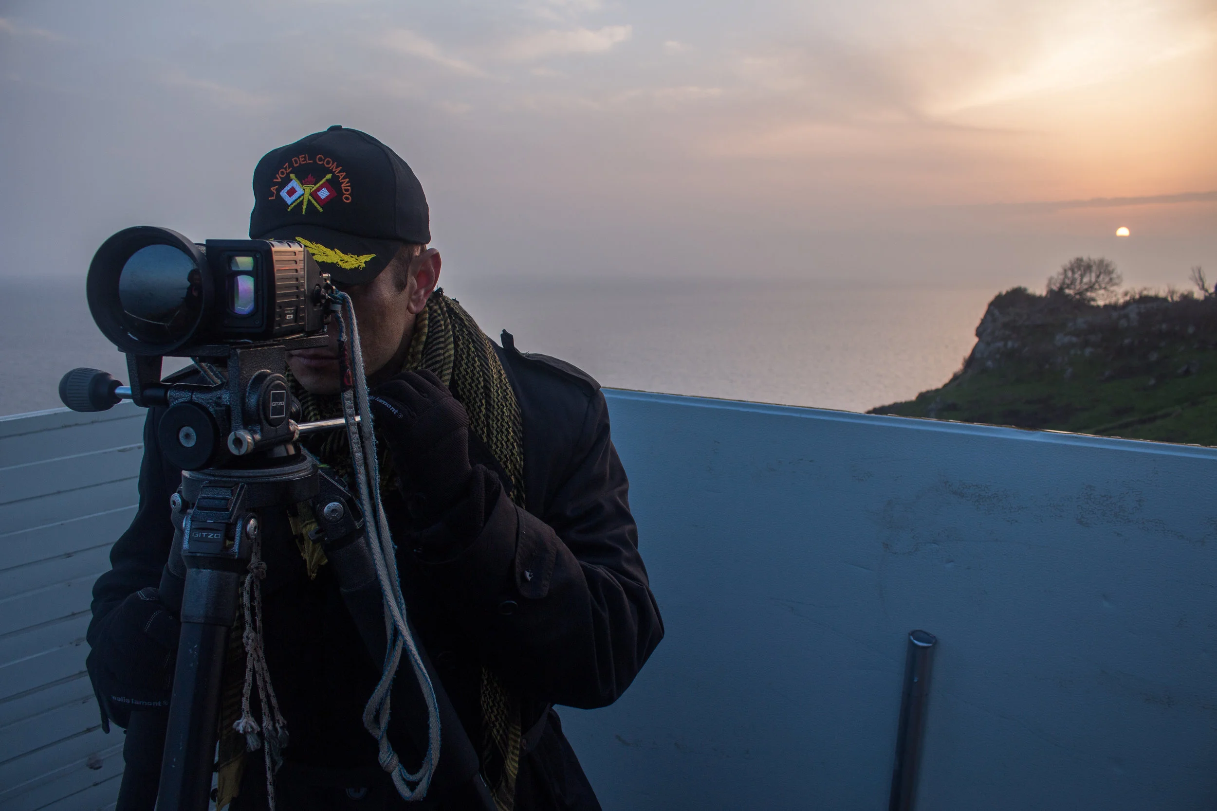  The sun rises on Agua International Water Relief and Lighthouse Relief volunteers after a night watching the coast of Lesbos for refugee vessels. 