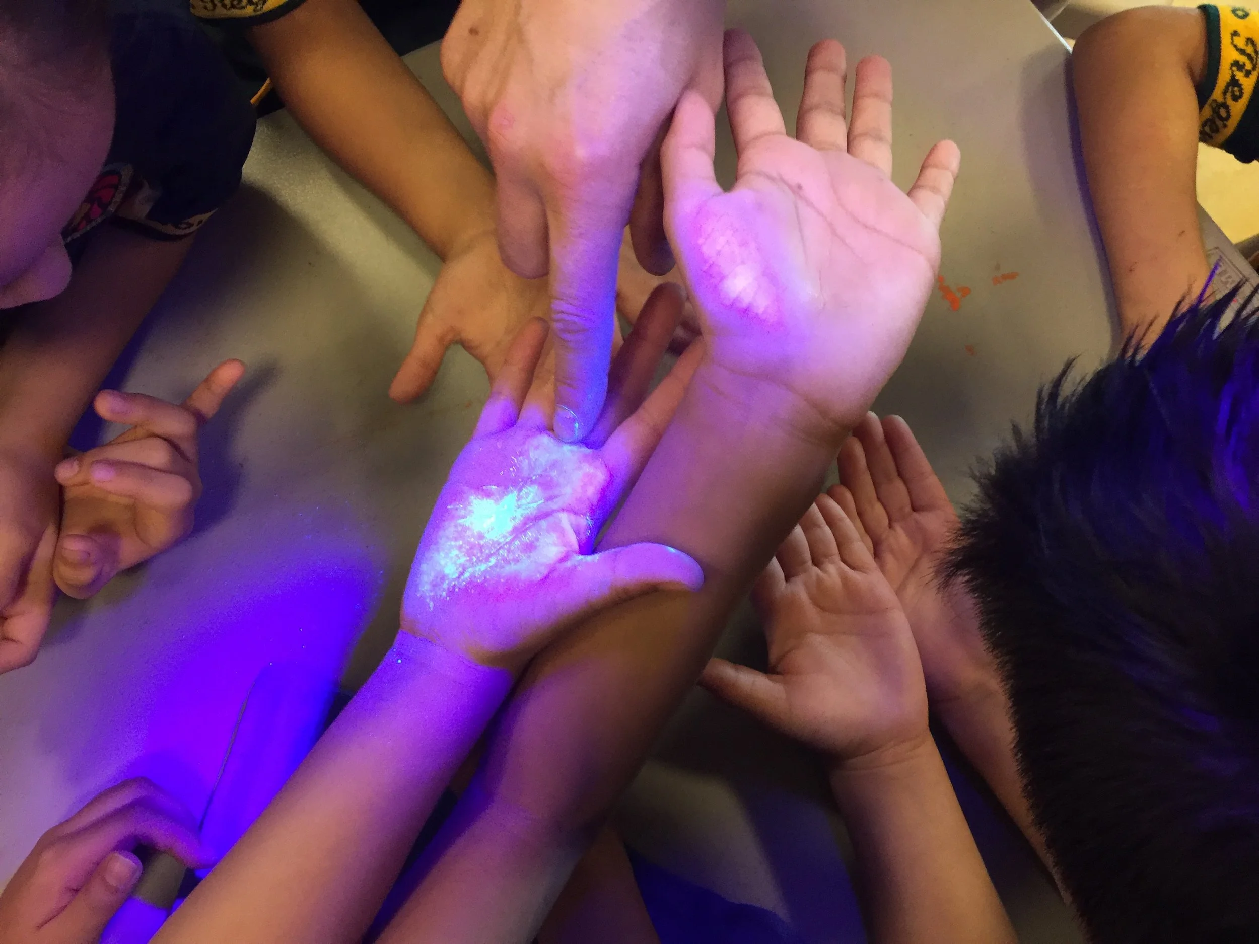  Glo-germ in action! The looks on the faces of the kids that didn’t get sprayed, and still had it on them was priceless.  A great hand-washing lesson! 