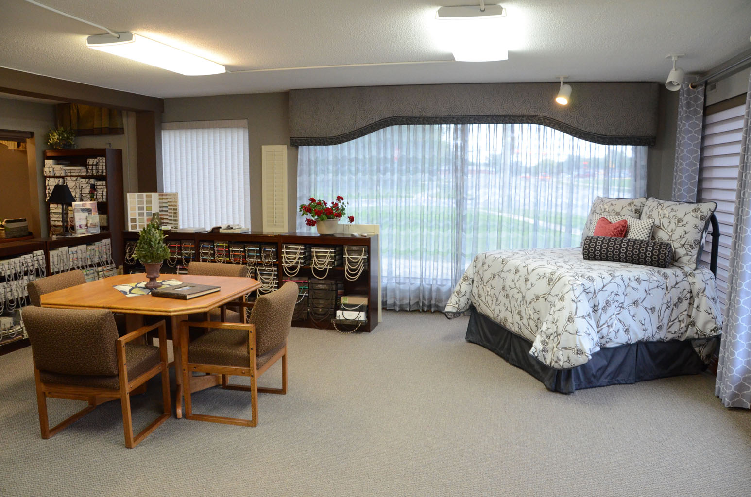 Showroom cornice drapes bed spread display