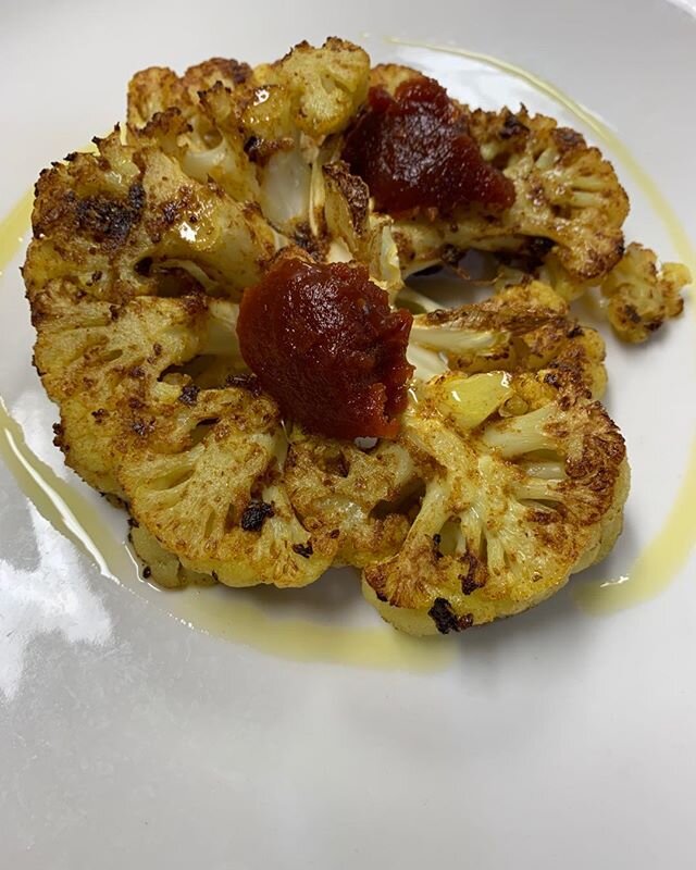 Roasted curried cauliflower, tomato jam and lemon oil. Easy to make and delish