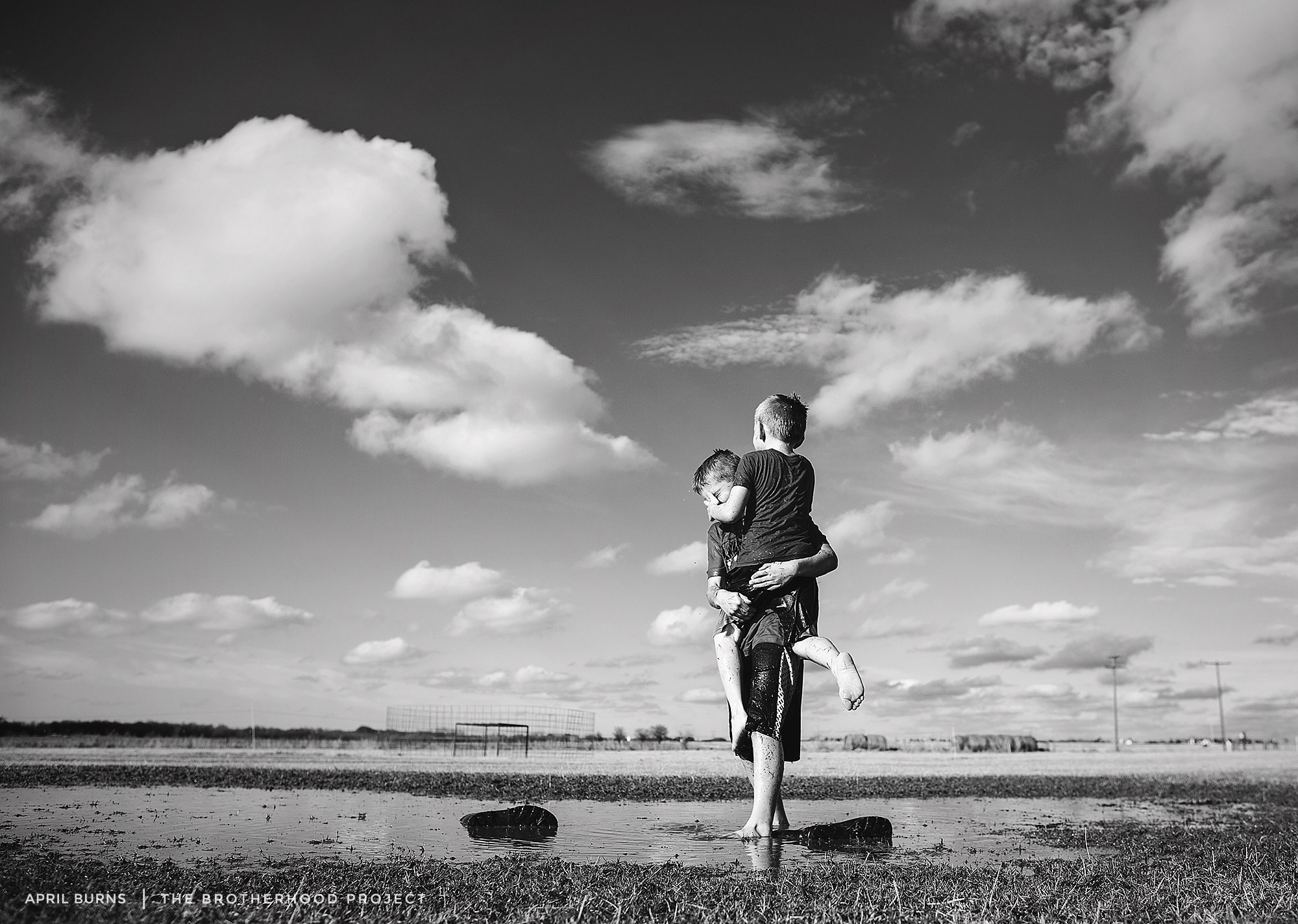 I love puffy clouds, mud puddles, rain boots full of water, laughs, soaked clothes, grass covered boys, muddy feet and giggles.. I will be sad when the two of you no longer want to play in the huge puddle in the front yard every spring. You fill your mud boots full of water and dump them over your heads and laugh so much! These moments are so precious and time is flying way to fast!! I love you both to the moon and back.