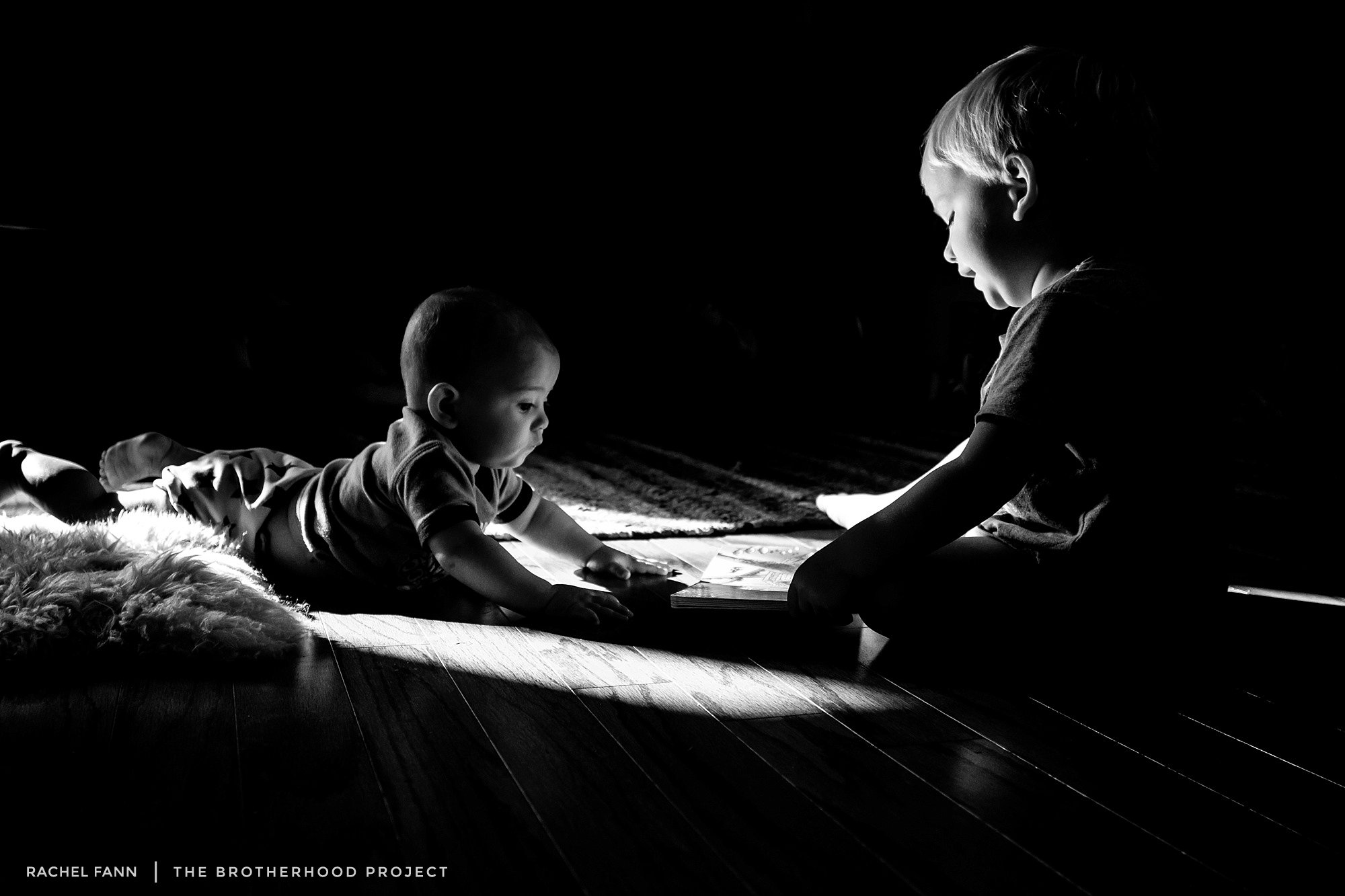 My boys. This month has been hard. It seems as though you’ve been fighting more than you’ve been friends. “I hate you” has outnumbered “I love you”. I’ve been struggling too. Many days I’ve gone back through old photographs of you boys just to remind myself that you do love each. You are best friends. Some days are just really tough. But when I see photos such as this one from two years ago — when one morning looked over as I cooked breakfast and saw you two sitting in the most perfect pocket of light. Big brother “reading” to little brother. And when I see these moments once again, my heart swells and I am reminded that all is right in the world. 