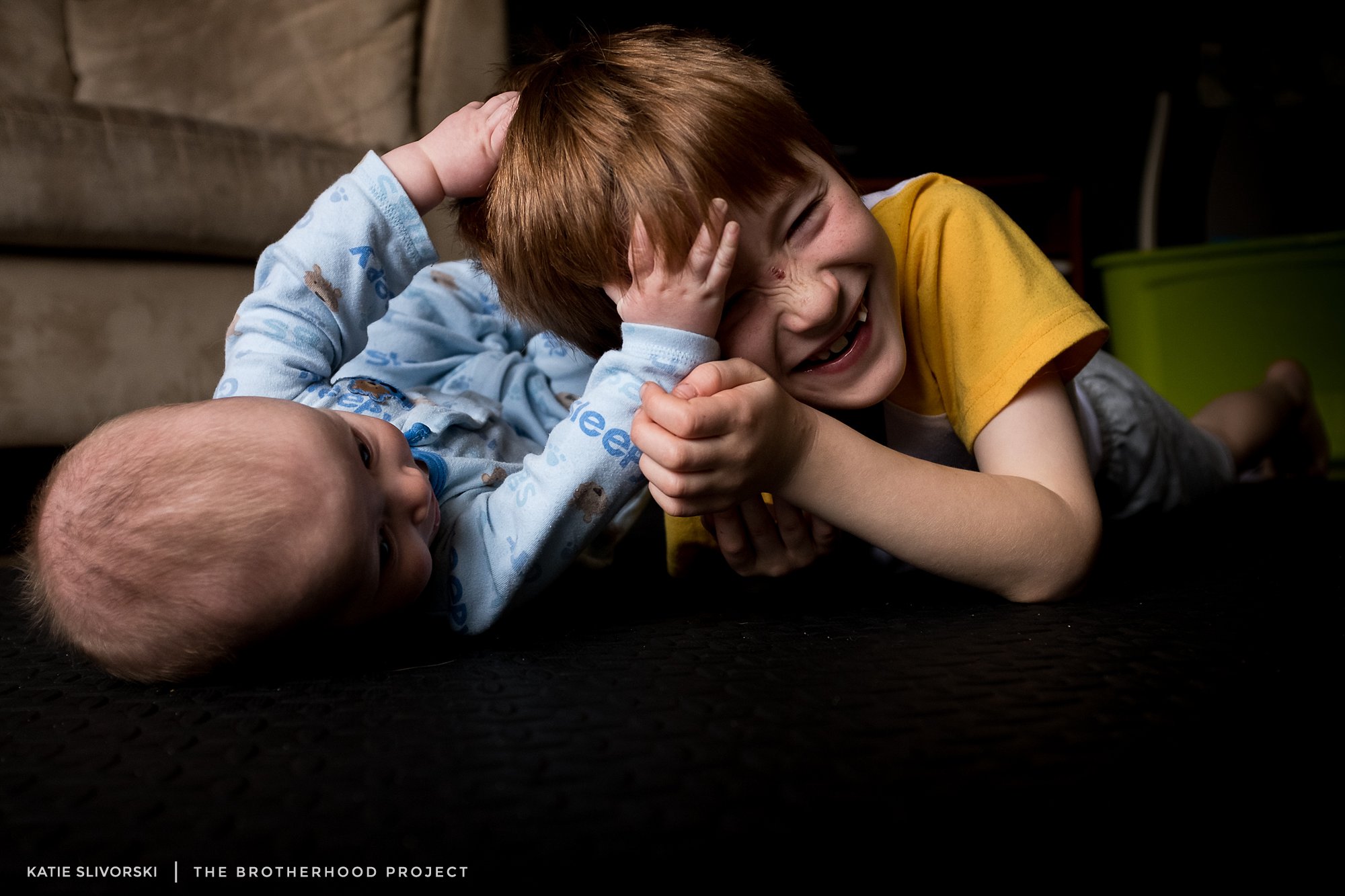 This is your little game, the way you've found to connect. Grant loves to get his fingers wrapped tightly in any hair that he can reach, so you give him your whole head, John, and let him dig in. Then you start screeching, "Nooo! Don't pull my hair!" and you yank your head back as he holds tight. I'm always surprised Grant isn't scared by the volume, but he thinks this is the greatest game ever and looks at you bright eyed and giggly.