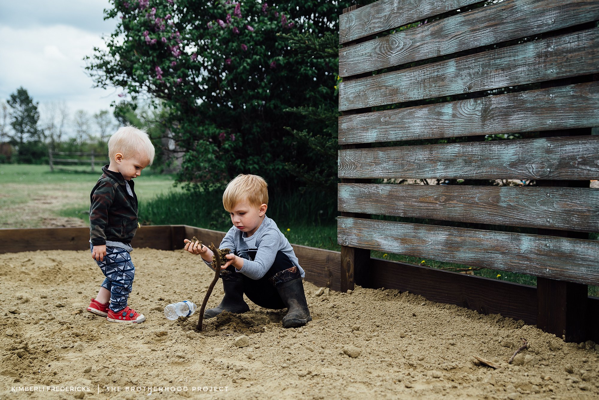 Sand and sticks- two of your greatest treasures and currently two of my greatest foes. The bigger of you doesn’t seem to be able to touch a stick without waving it or hitting it in someone’s face, and the littler of you is quickly learning to follow suit. Right now is the age of pushing boundaries and exploration, and it almost always ends with one (or both) of you crying. Colter, you can’t resist dumping at least one bucket of sand over your little brother’s head, or throwing it in his face. He’s learning to do this too! The new sandbox is adored by you both, and sand covers the floor of the house at all times to prove it. I love watching the two of you teach and learn, and find your own selves. The newest, best game involves laughing hysterically at each other just because you can, and you add bonus points if it drives your sister crazy. The emotions couldn’t run much higher in this house, the chaos couldn’t be much bigger, and life couldn’t be much sweeter.