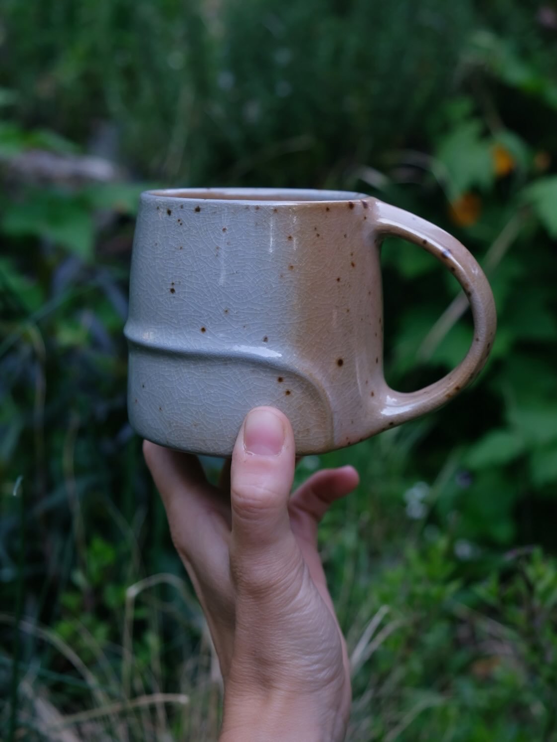 A couple wood fired mugs. Still need to sand the bottoms smooth, which is the last step in what feels like a 1,000 step process to make these little treasures ✨