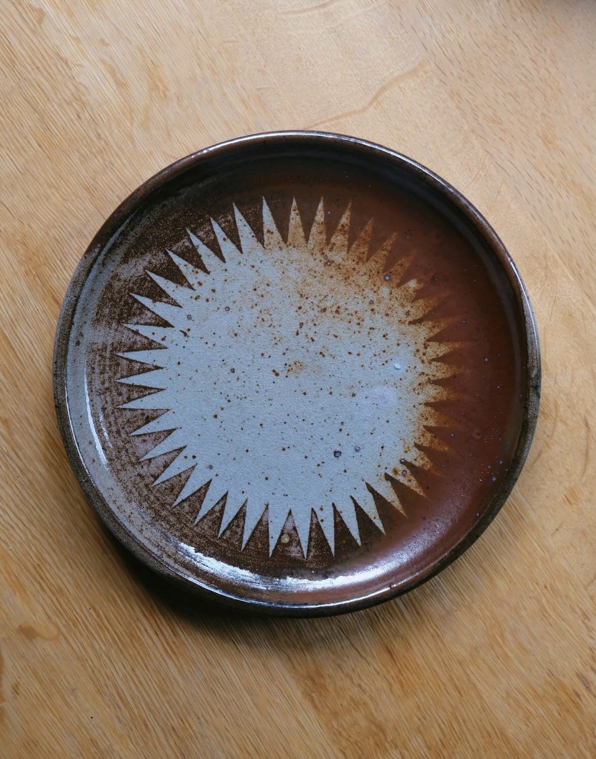 Plates. #2 was stacked on top of #3 in the wood kiln and got some nice flashing marks from the path of the flame 🔥