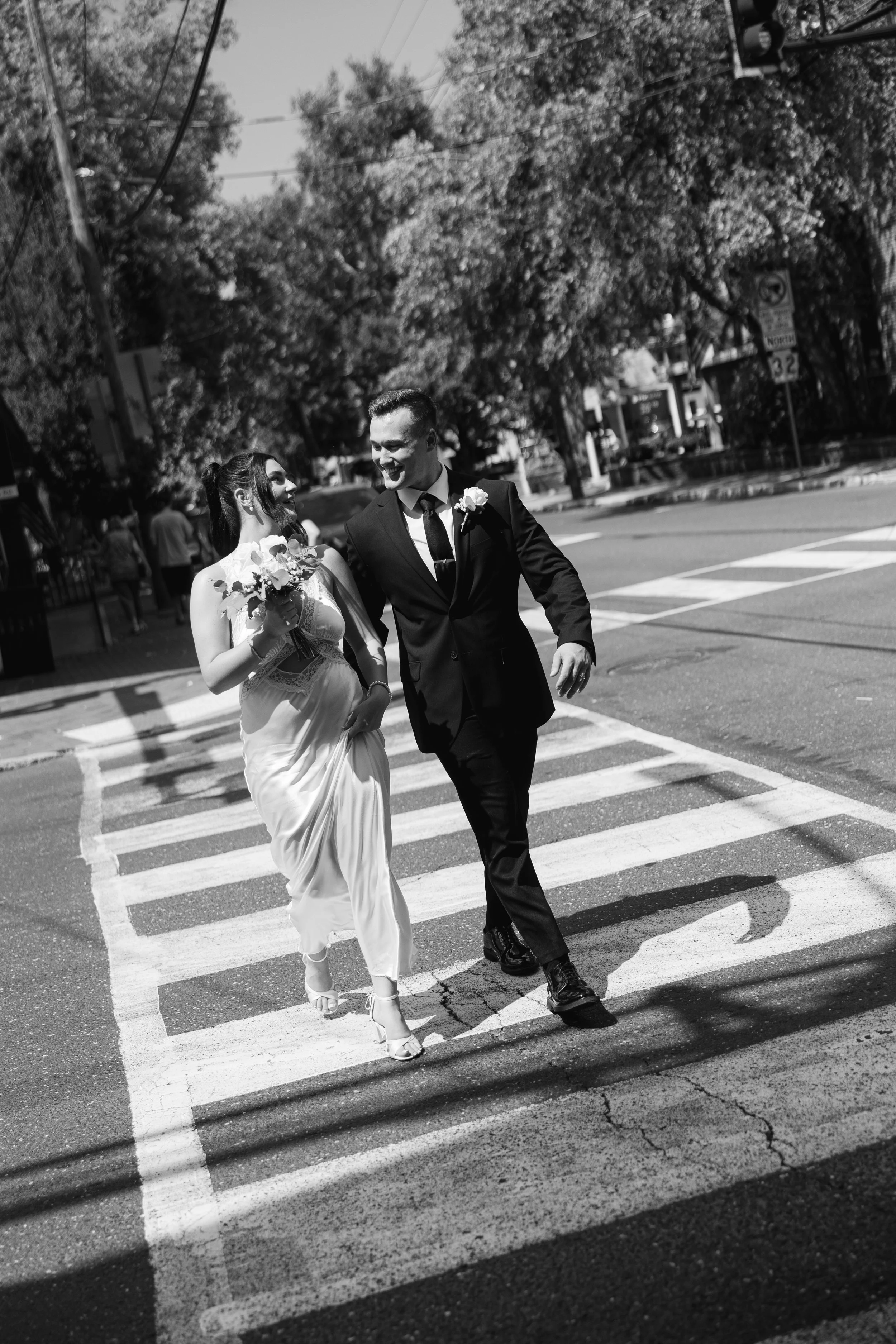 Newlywed couple exploring historic New Hope Pennsylvania during their elopement