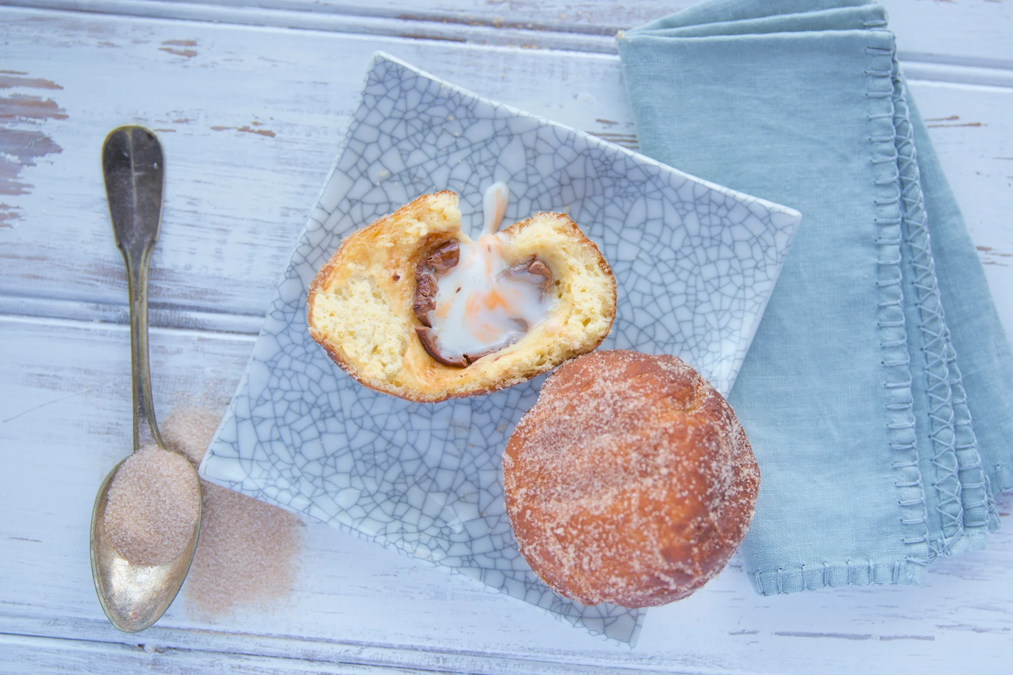 'Scotch' Cadbury Creme Eggs wrapped in a layer of donut dough and sprinkled with cinnamon sugar. For News.com.au, April 2016.