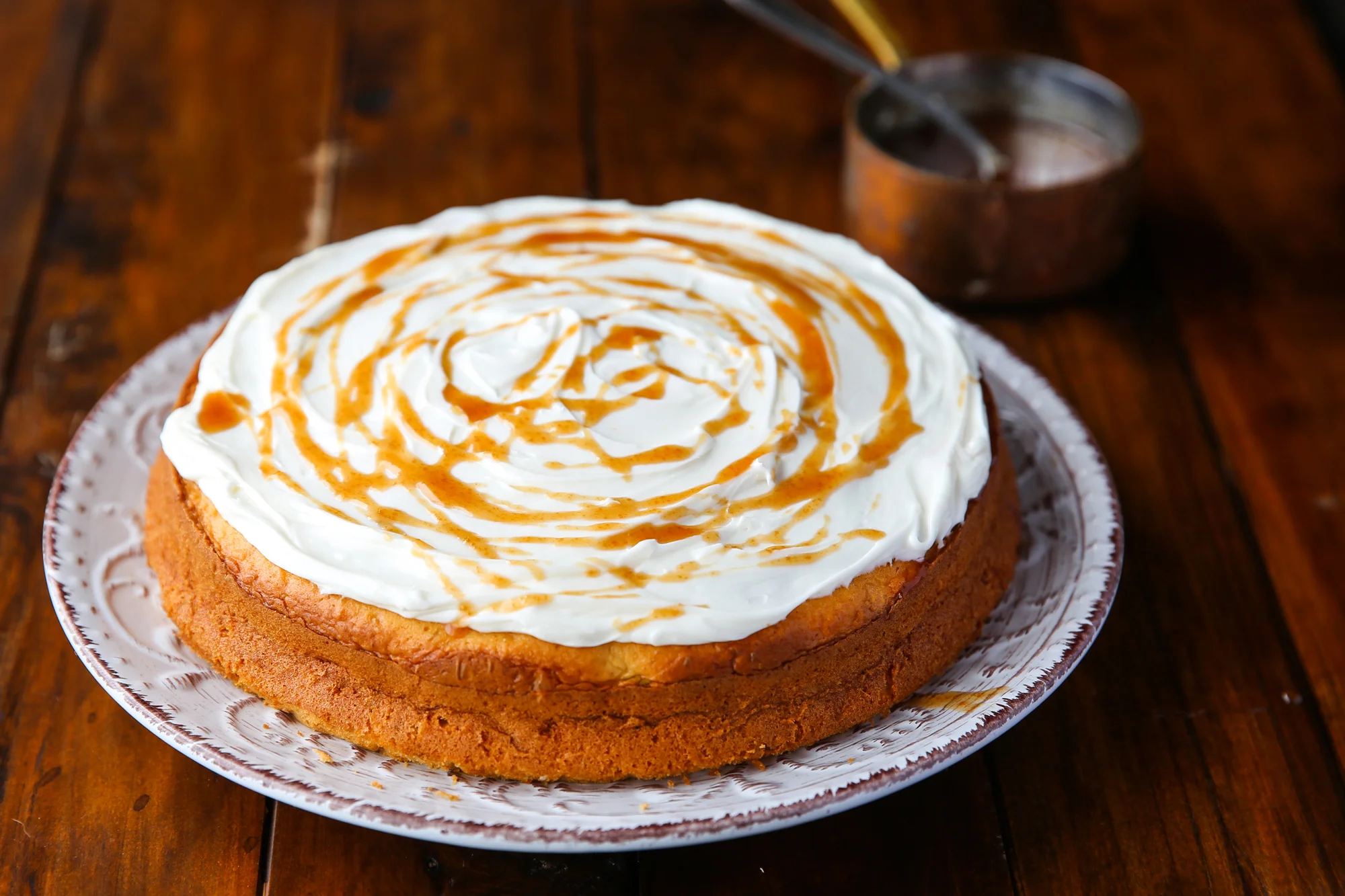 Toffee apple 'poke' cake: apple tea cake covered in small holes filled with warm caramel sauce. For News.com.au, May 2016.