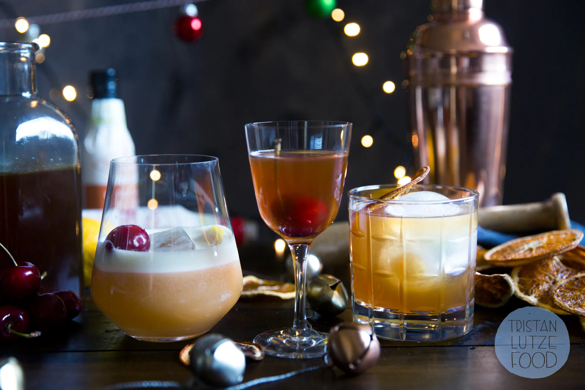 Christmas whiskey sour, Manhattan and Old Fashioned, all made with Christmas pudding-infused whiskey.