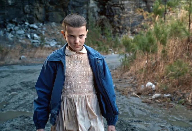Millie Bobby Brown appears in a scene from Stranger Things. | IMAGE courtesy of NETFLIX