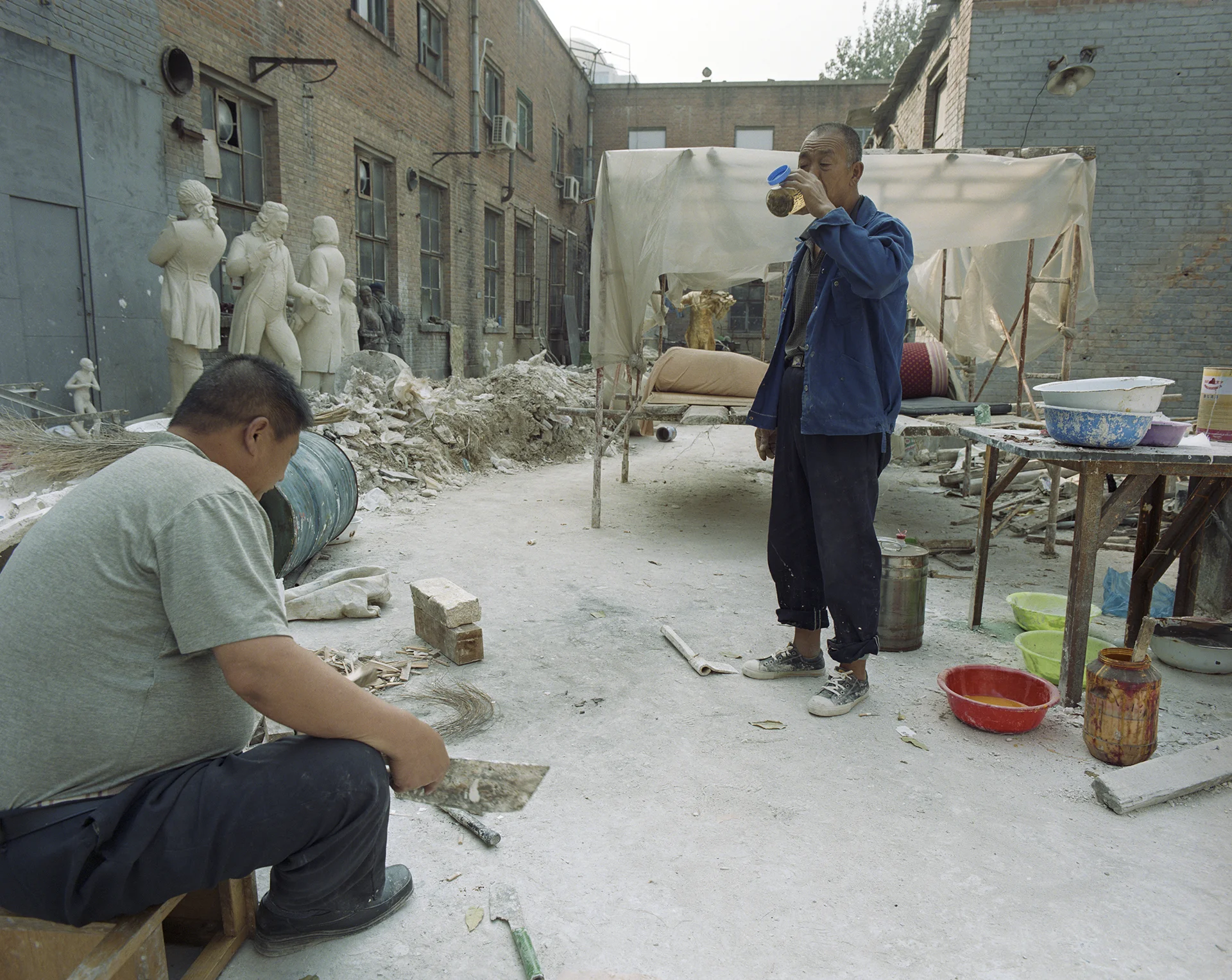 Workers at their work- and living space in 798 - the Beijing Art District