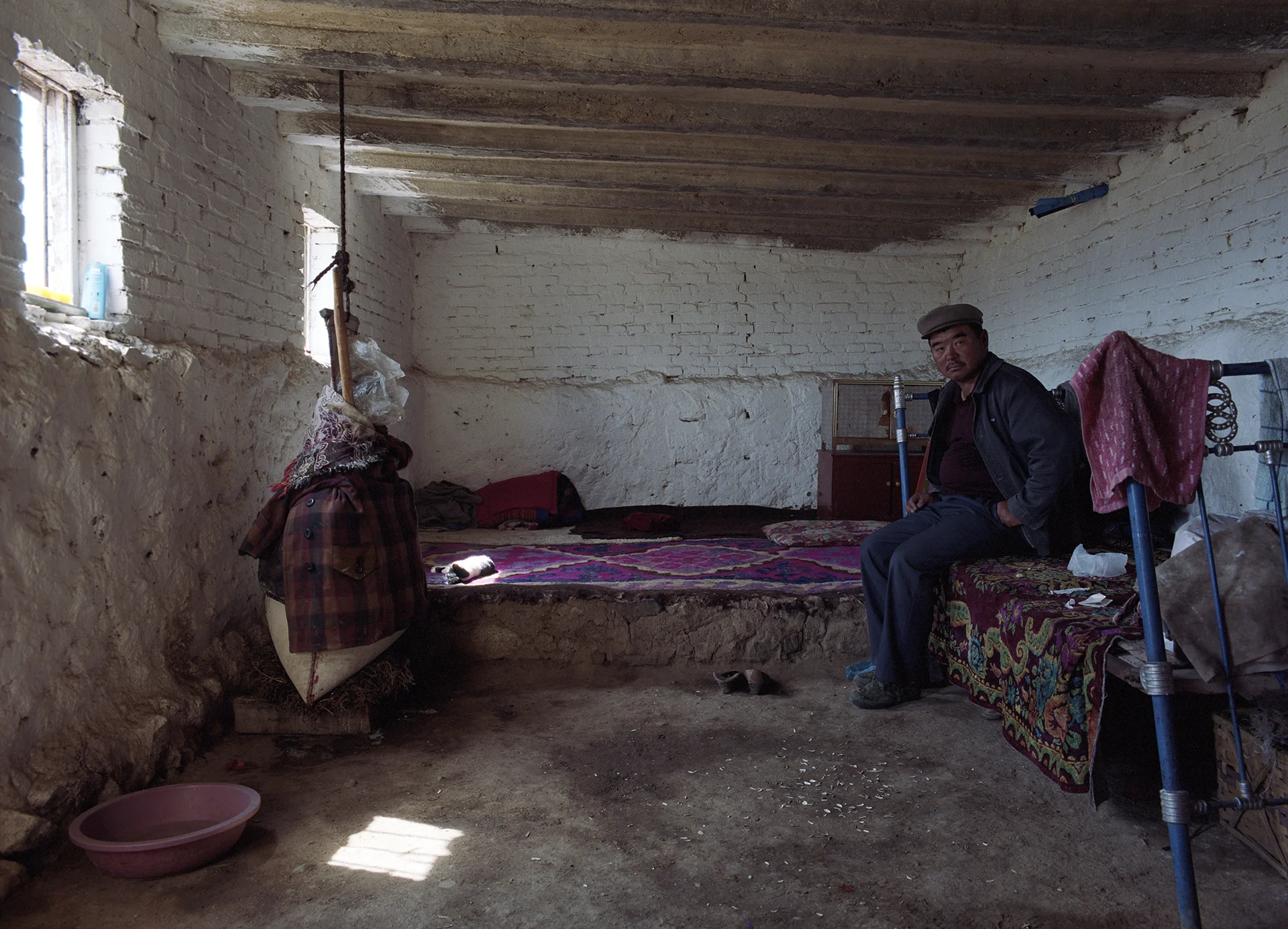 2007 Xinjiang - a Mongolian cheese maker in his summer home.