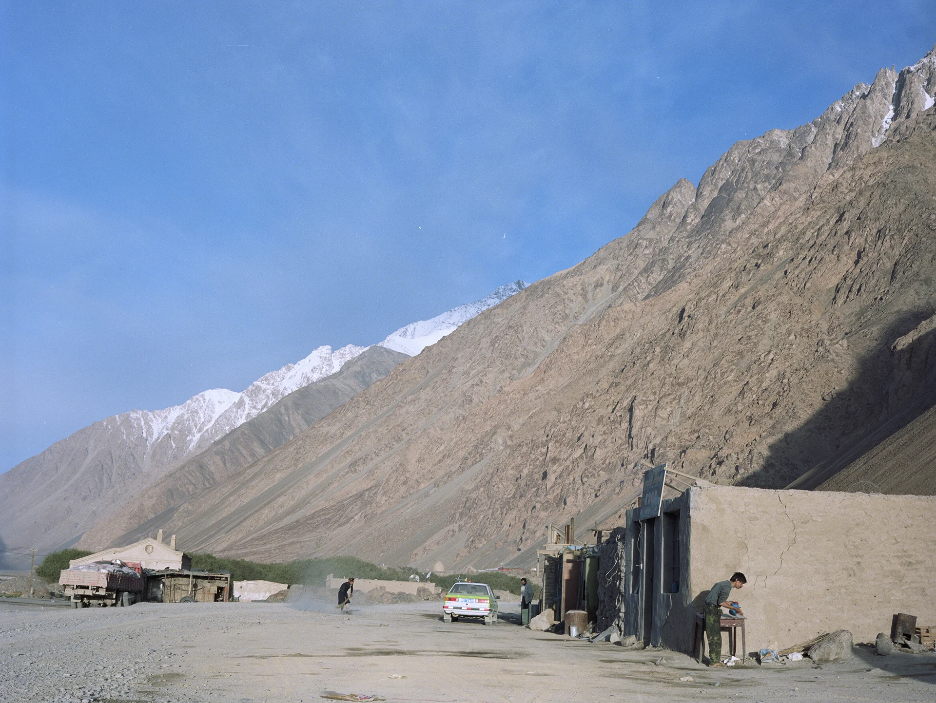 2007 Xinjiang - Mazar, two guesthouses and a truck repair place.