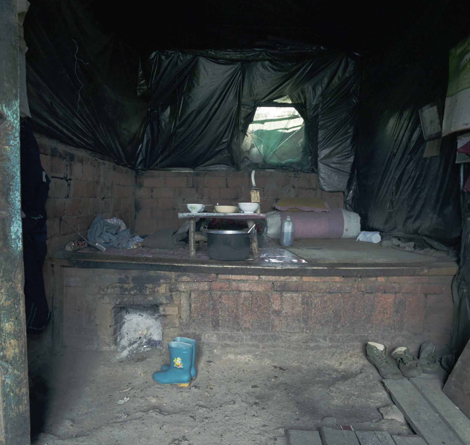 2008 Heilongjiang - goat herders shelter in the ruins of a house. 