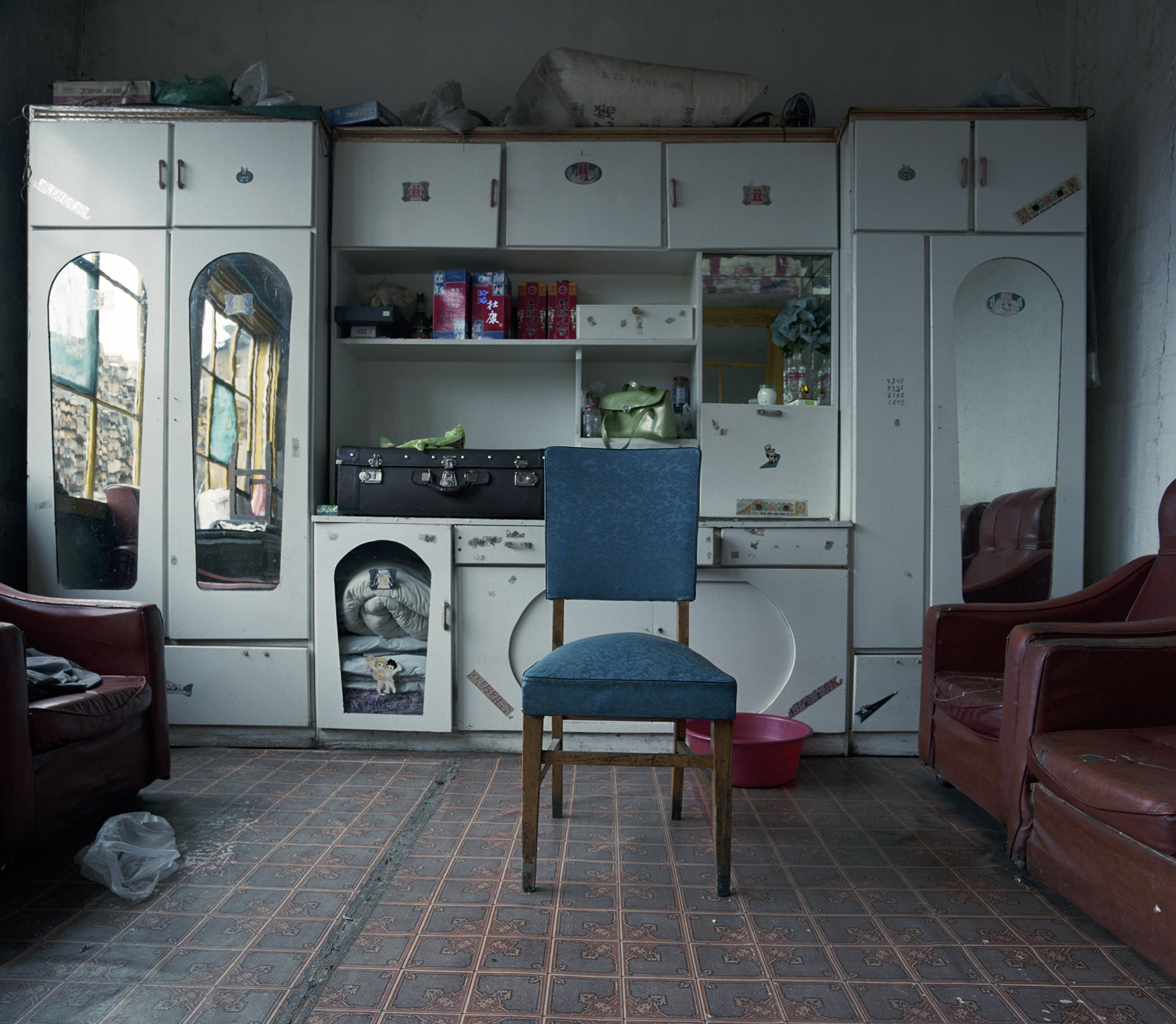 2008 Heilongjiang - This interior is more Russian than Chinese with this beautiful blue chair and the big leather sofa's.