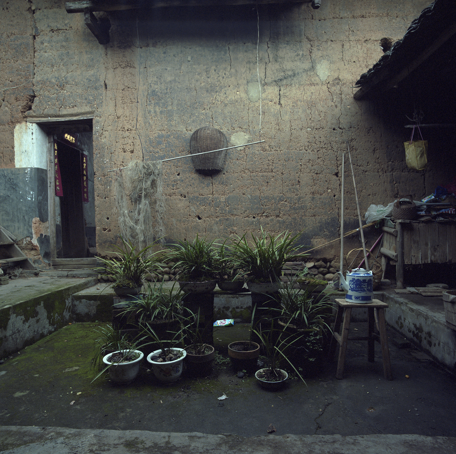 2009 Fujian - nice inner court.The basin has long been the only water source. Now there is a running tap in the village.