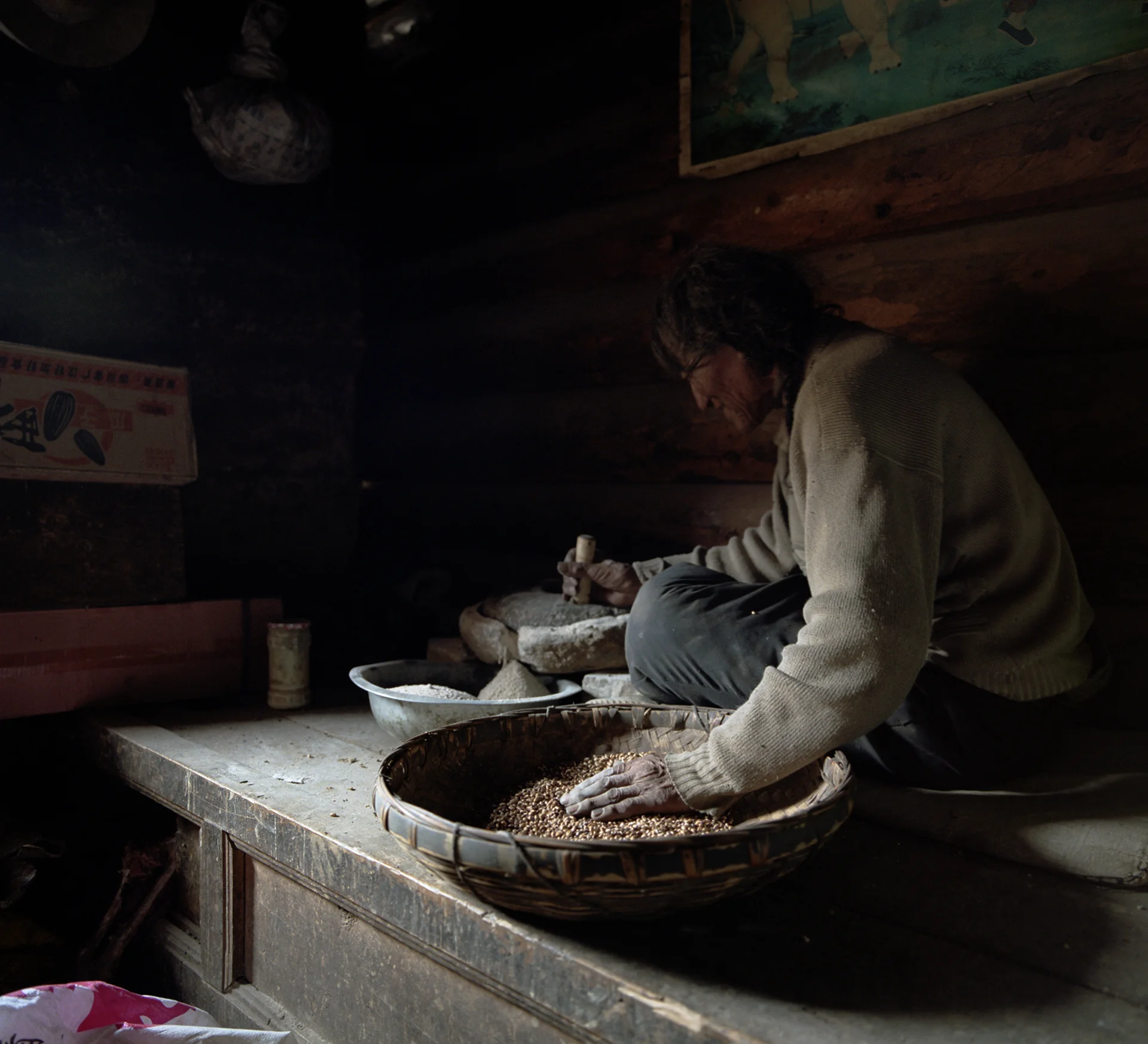 2010, near Maniggago - grinding flour.