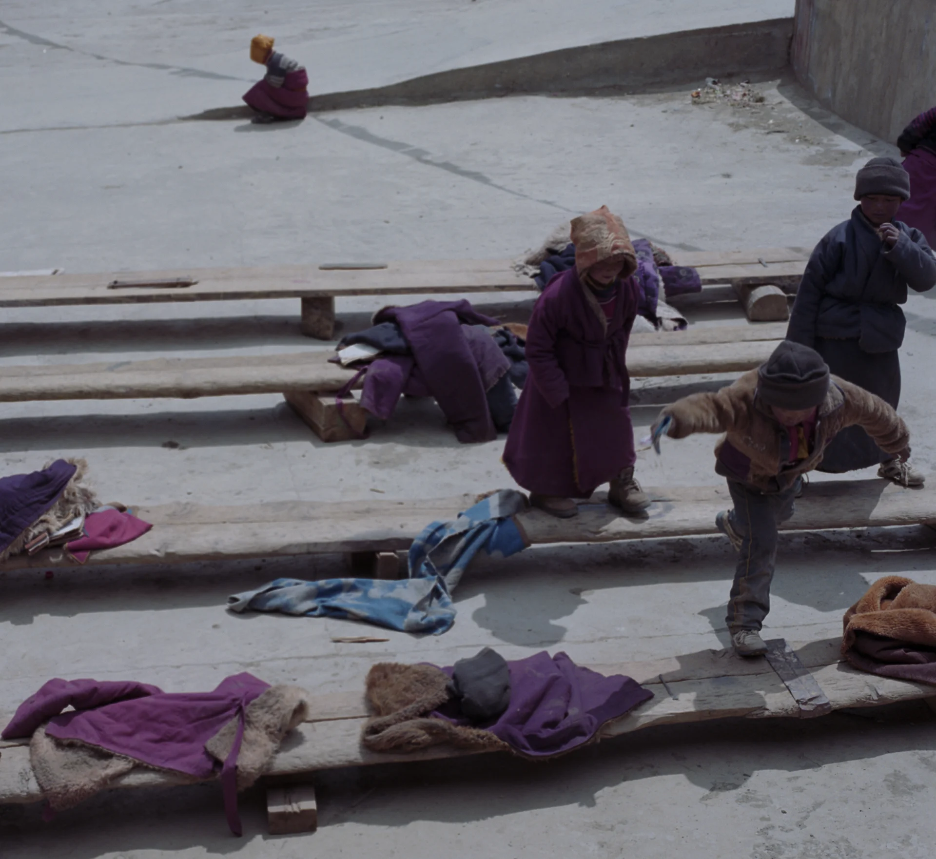 2010, near Bayu - monks playing in their school during the break.