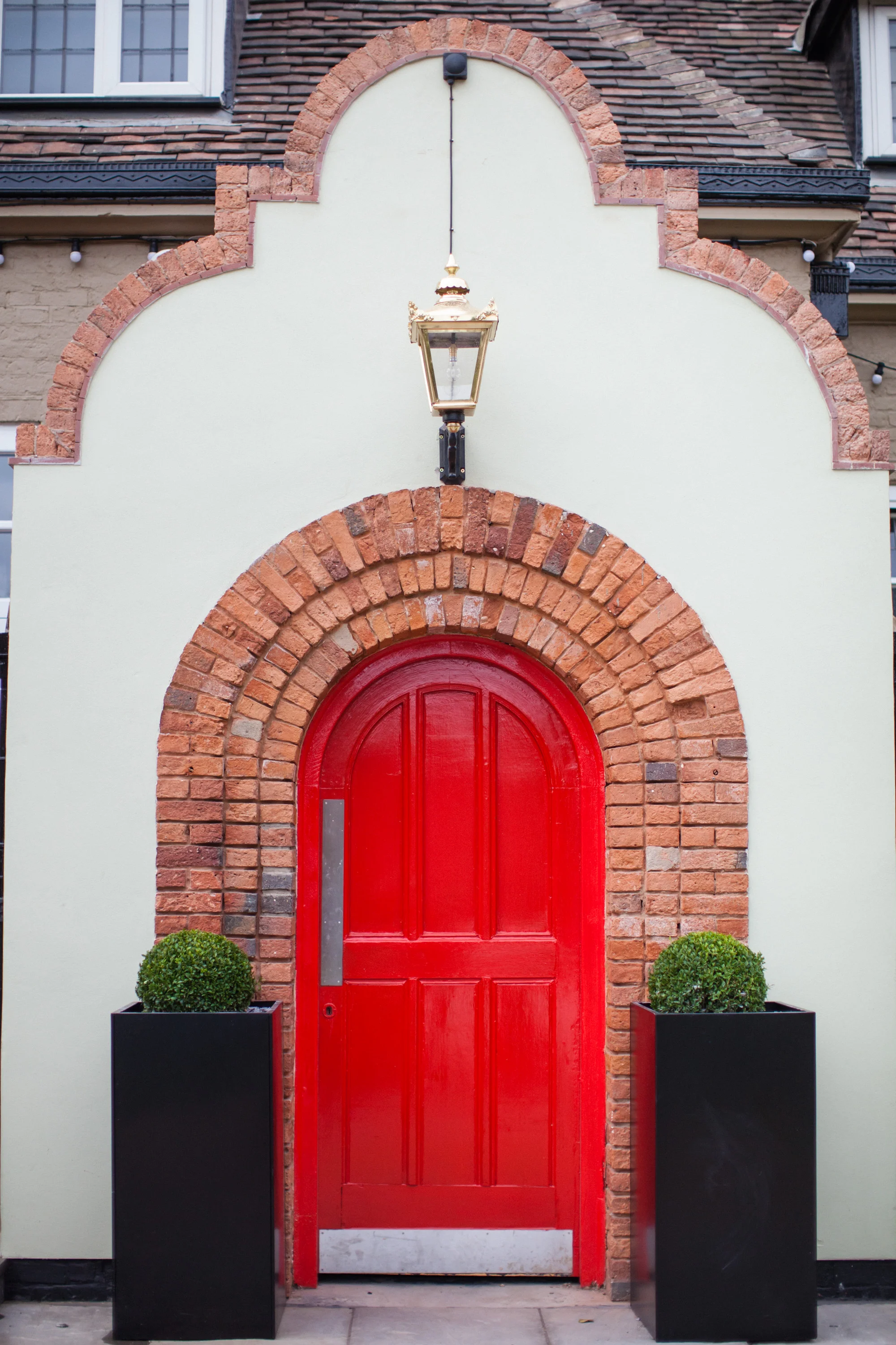 BH_EXT_RED_DOOR_FRONTON_PORTRAIT.jpg