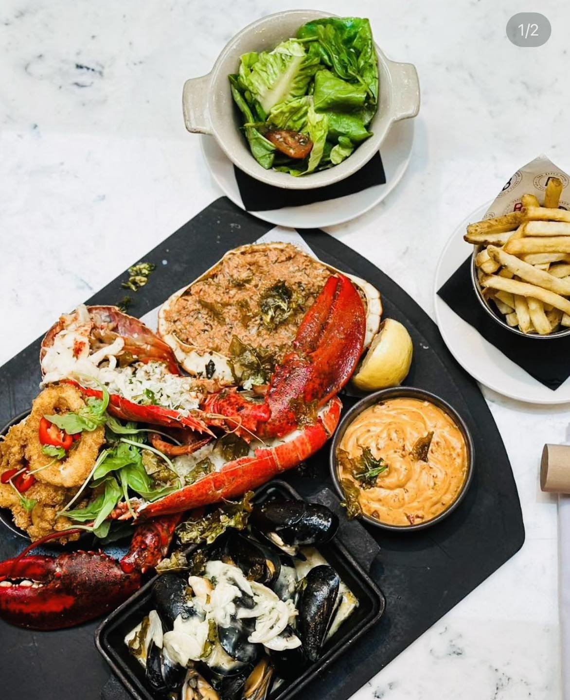 🦞Join us for Lobster &amp; Friends🦞

Saturday 26th October from 6pm.

This includes -

🦞Whole Lobster, Garlic Butter 
🦞Crispy Squid
🦞House salad
🦞Fries
🦞Steamed Shetland Mussels 
🦞Dressed Crab
🦞Bottle of Prosecco 

&pound;95 per couple - Boo