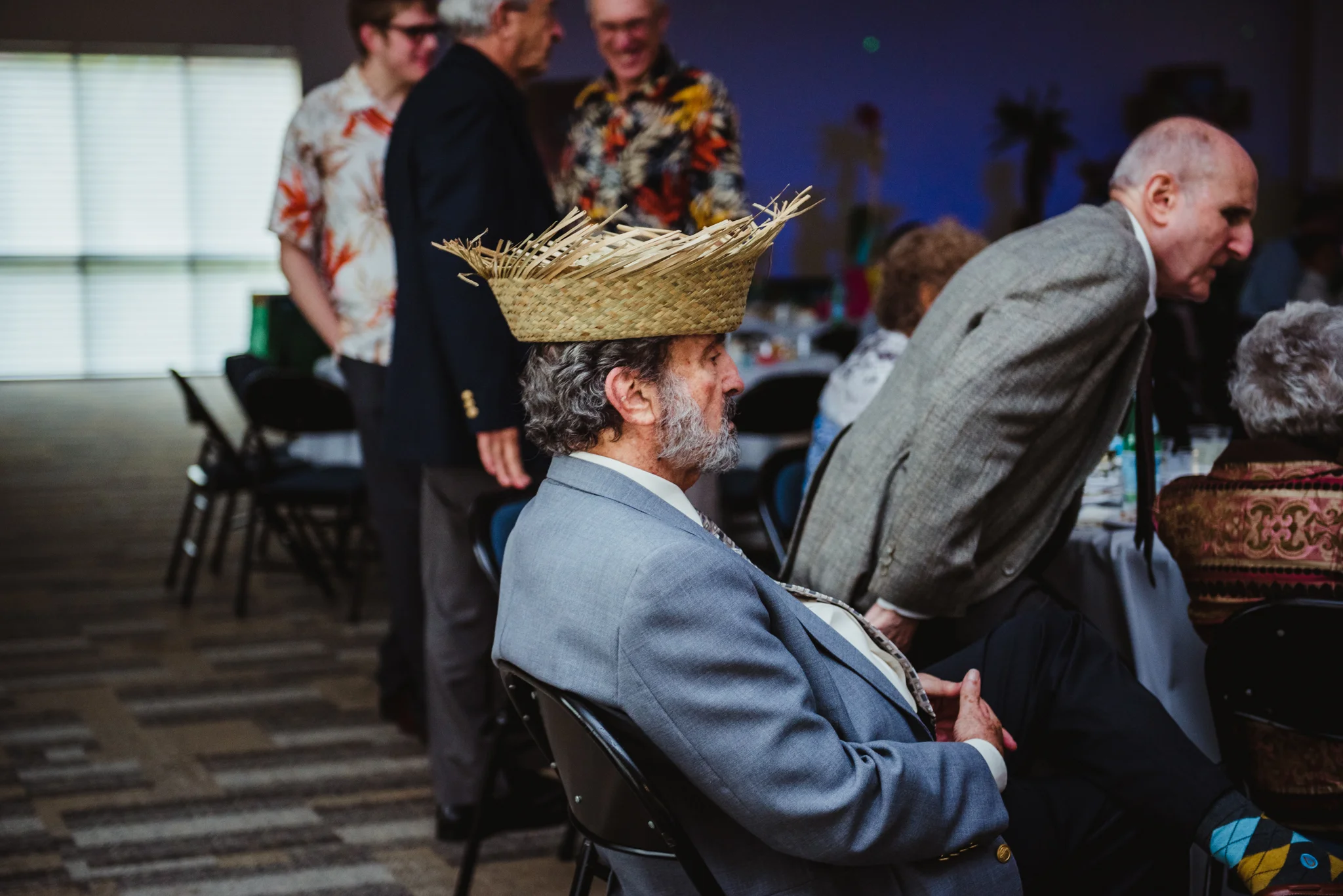 wearing-a-hula-hat-while-watching-the-dancing-at-the-mitzvah-celebration.jpg