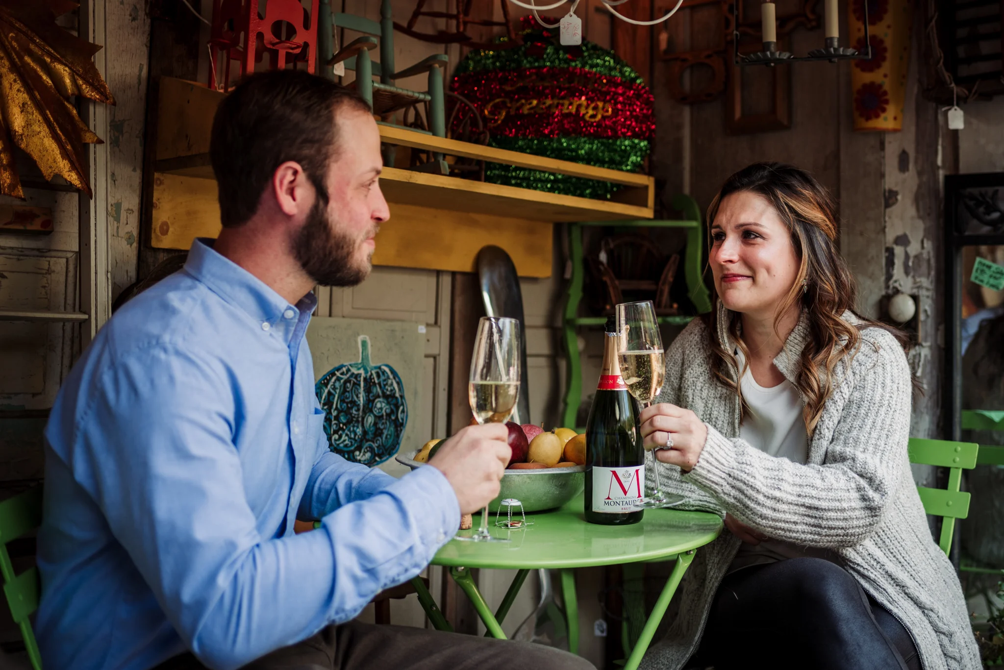 toasting-their-dating-anniversary-during-their-engagement-session.jpg