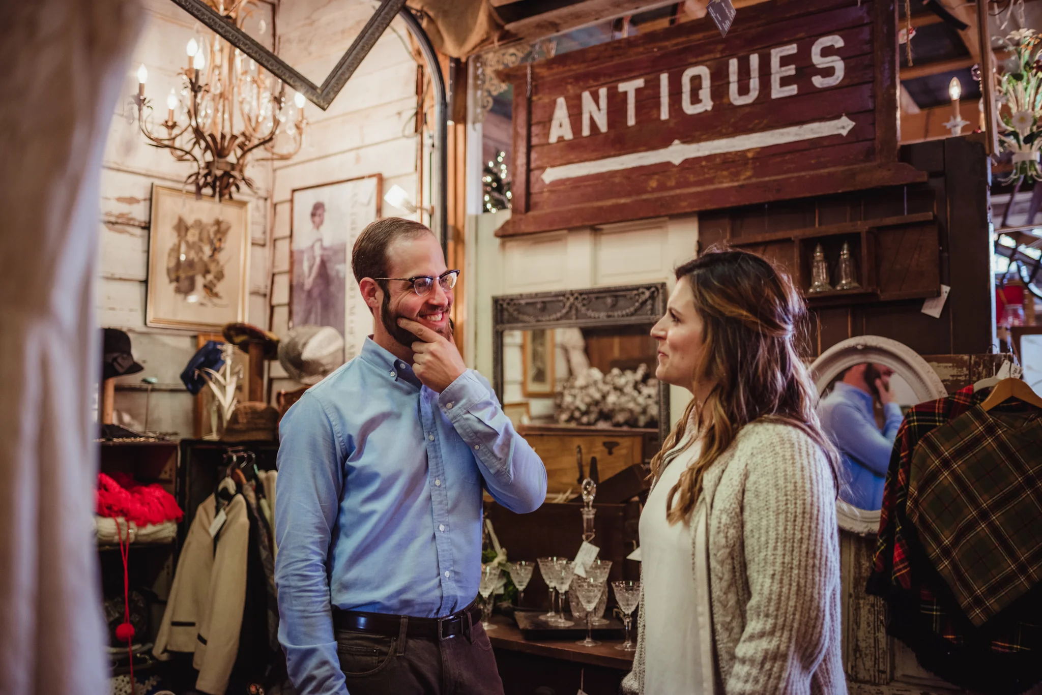 pondering-the-antiques-during-their-engagement-shoot.jpg