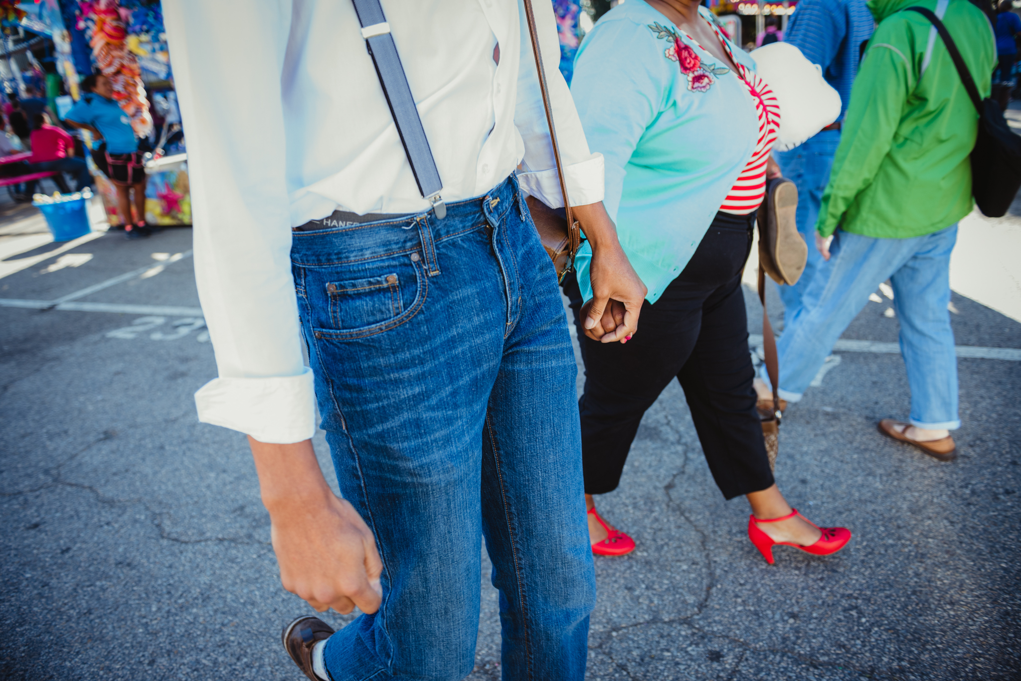holding-hands-at-the-NC-State-Fair.jpg