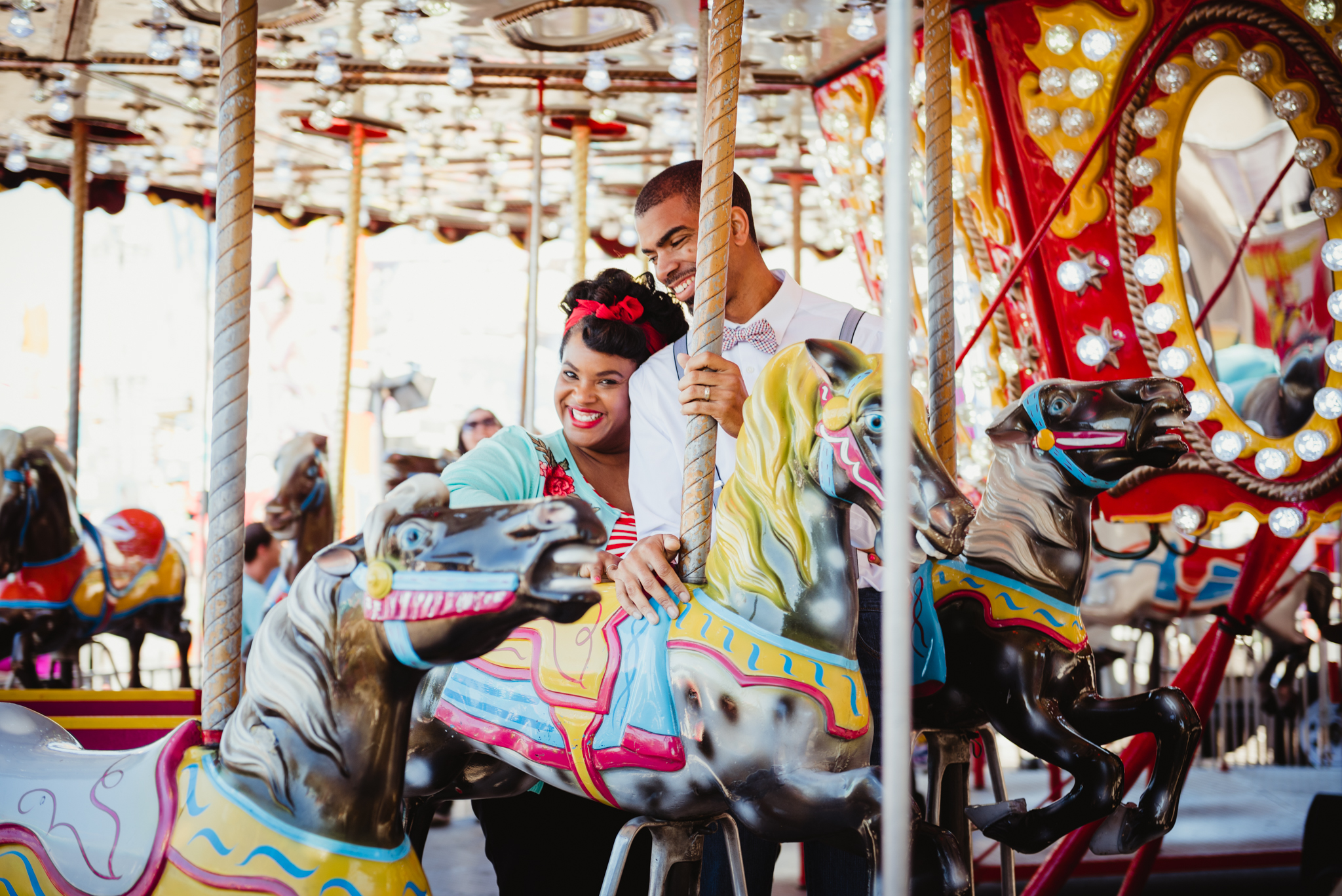 a-sweet-snuggle-while-riding-the-carousel-at-the-NC-State-fair.jpg