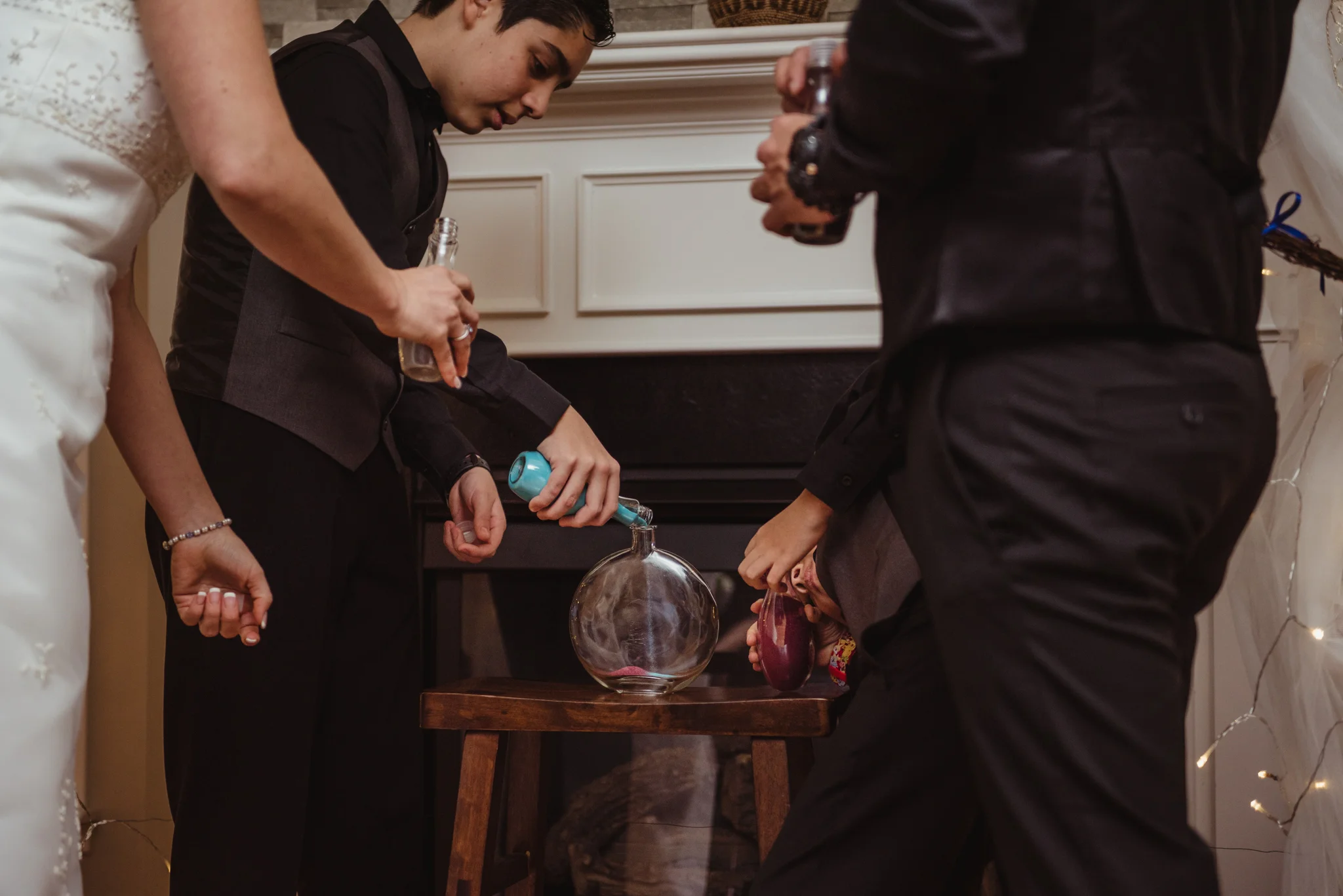 the-soon-to-be-family-of-four-have-a-sand-ceremony-at-their-intimate-home-wedding-in-Raleigh.jpg