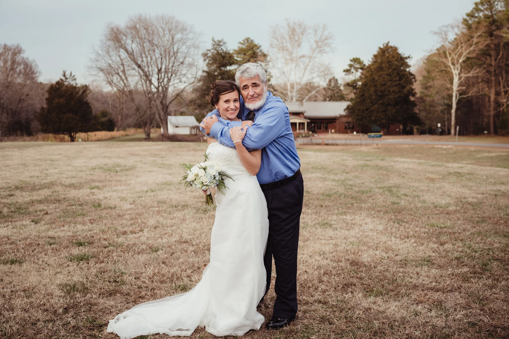 the-bride-and-her-father-in-the-park-in-Raleigh.jpg