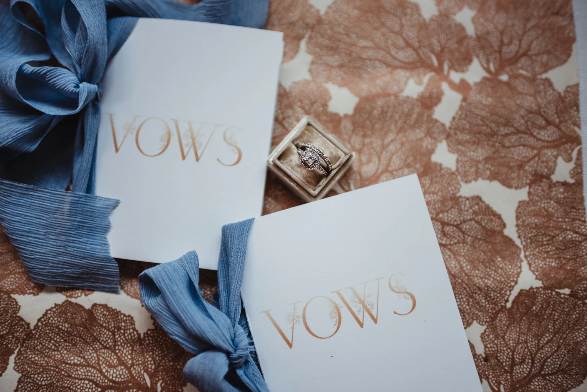 raleigh-wedding-photographer-beach-wedding-details-rings-and-vows.jpg