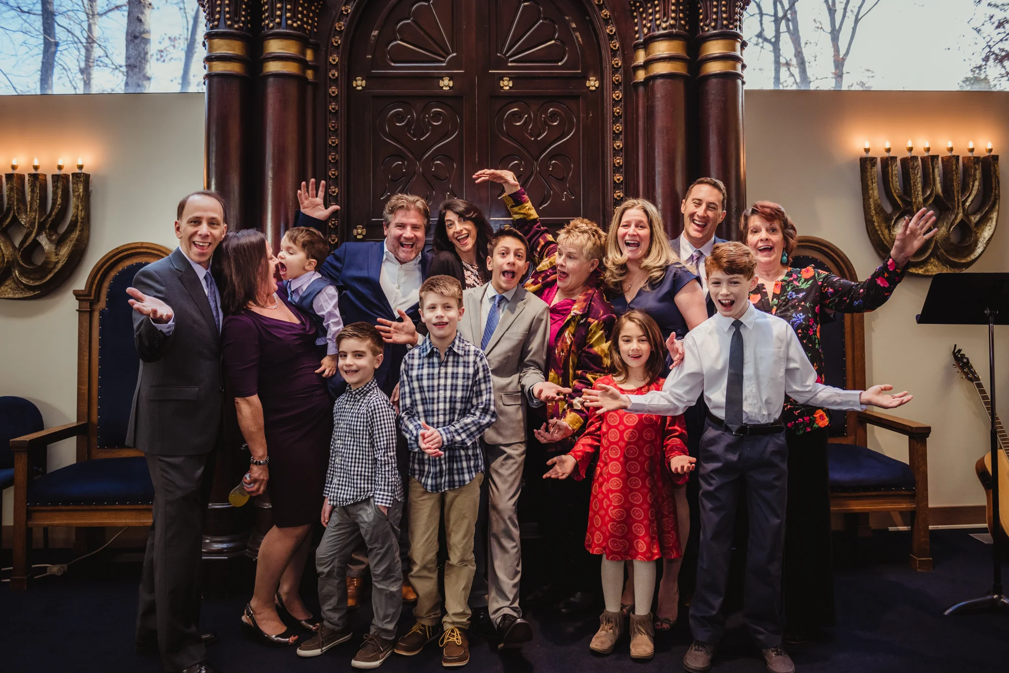 Noah's Family celebrates together on the bema before he becomes bar mitzvah at Temple Beth Or!