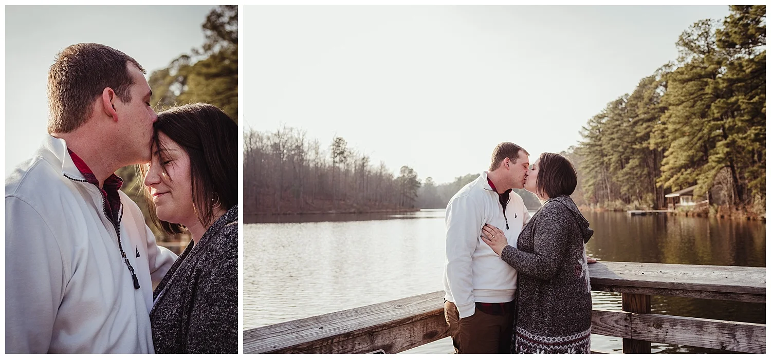 The engaged couple kiss on the dock at Durant Nature Park in Raleigh for their pictures with Rose Trail Images.