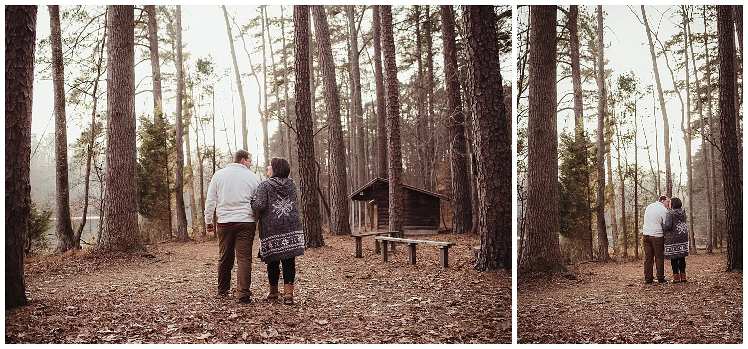 The engaged couple take a walk in the woods together at Durant Nature Park in Raleigh during their engagement session with Rose Trail Images.
