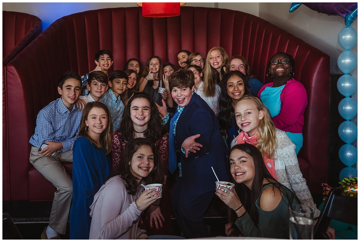 The mitzvah boy and his friends pose for the camera during his mitzvah celebration at Solas nightclub in downtown Raleigh, NC. 