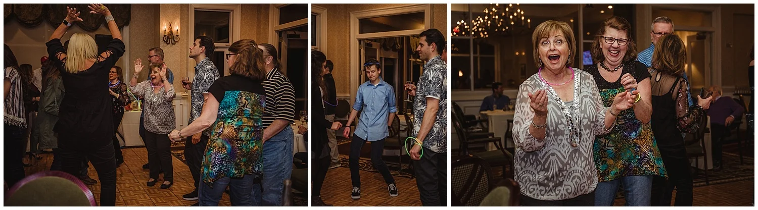 Guests dance with glow sticks during the mitzvah reception party with Rose Trail Images at the Brier Creek Country Club in Raleigh, NC.