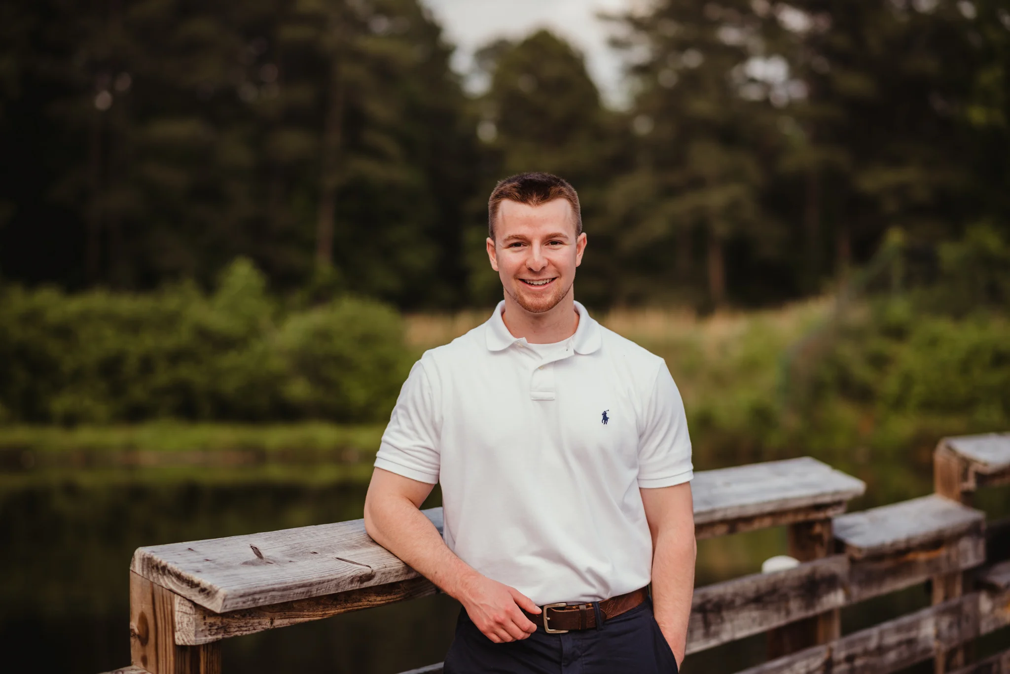 Harrison had his senior portraits done by the lake at Durant Nature Preserve in Raleigh, NC by Rose Trail Images.