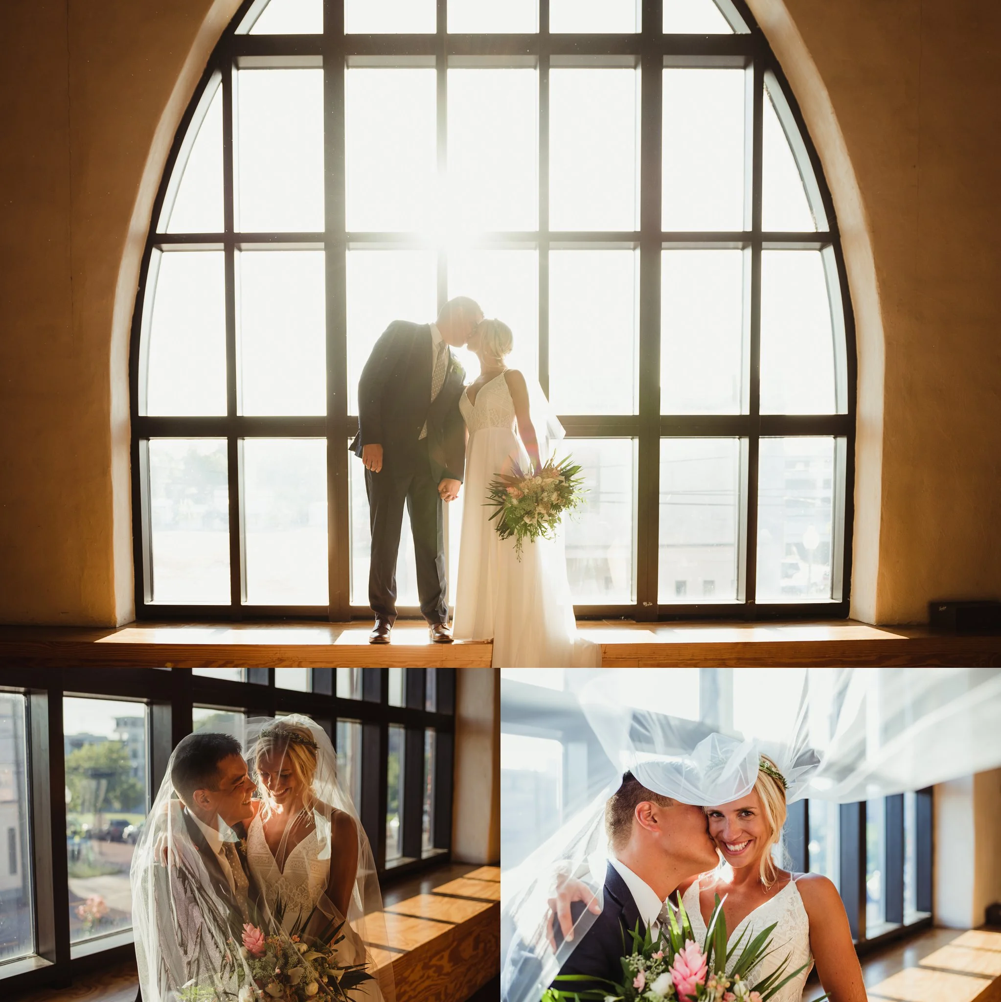 The bride and groom pose for pictures at a big picture window at the Brooklyn Arts Center after their wedding in Wilmington, NC, photos by Rose Trail Images.