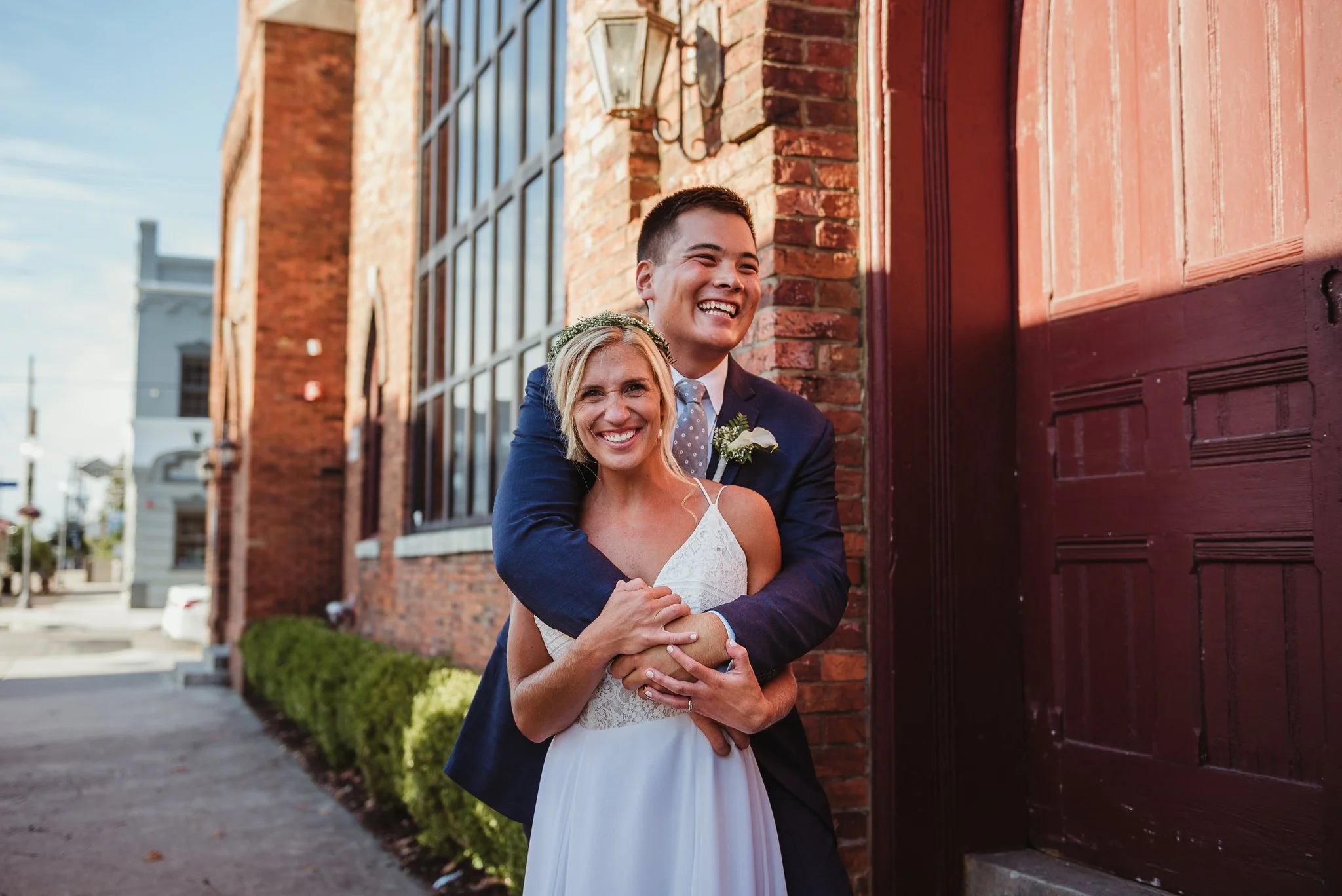 The bride and groom pose for Rose Trail Images after their wedding ceremony in Wilmington, North Carolina.