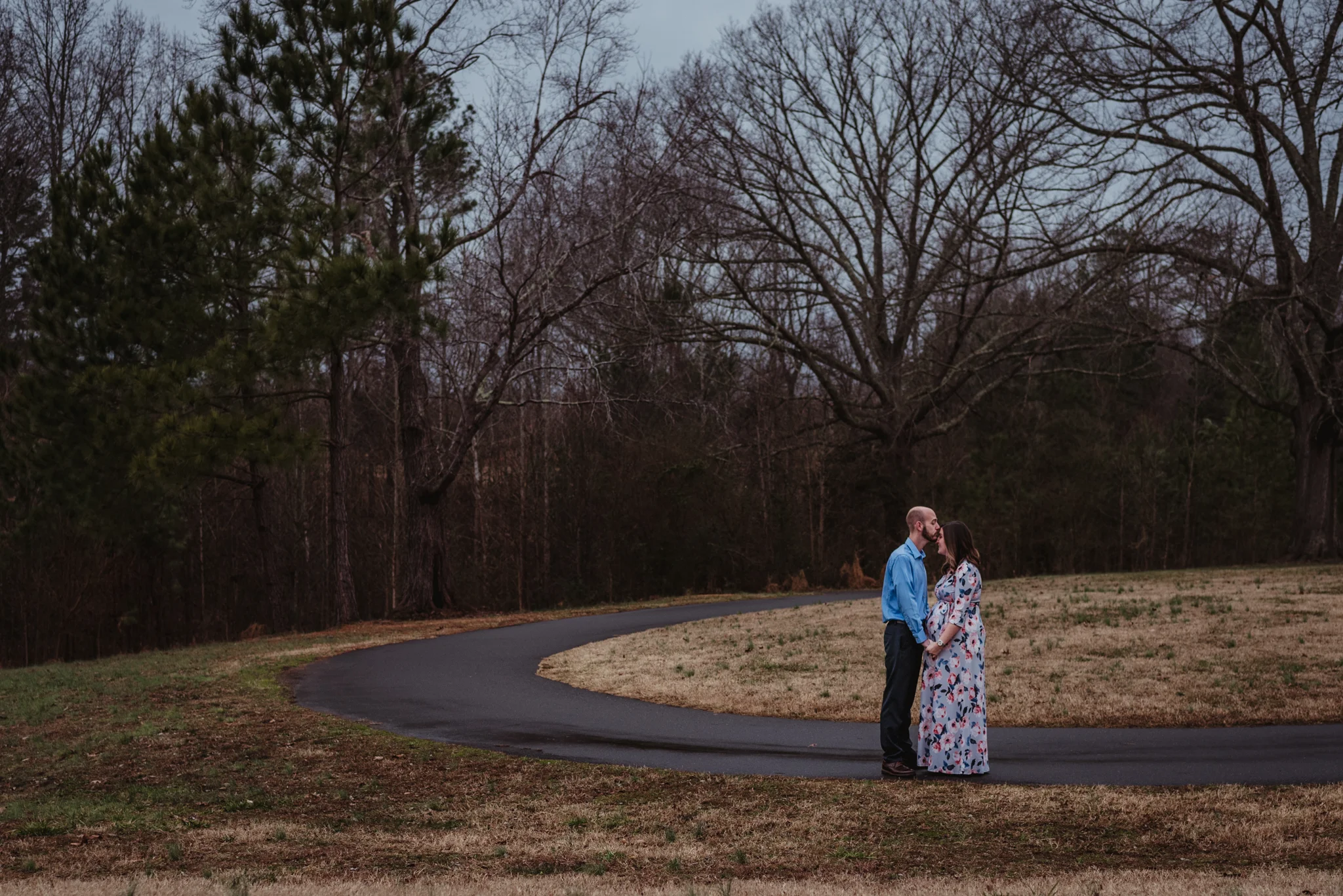 The parents to be pray for each other, picture taken by Rose Trail Images at Joyner Park in Wake Forest, NC.