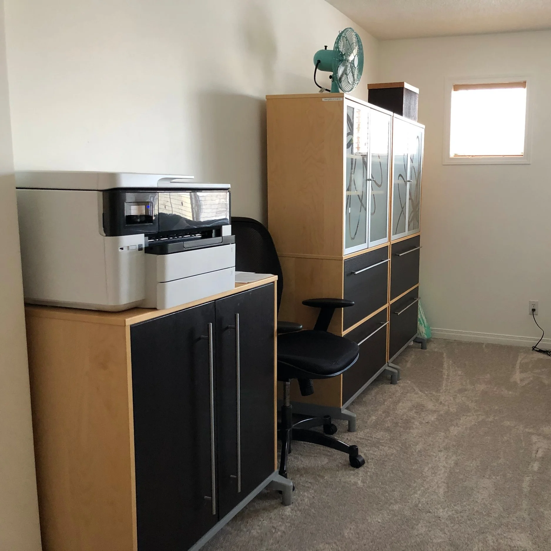Back end of the newly organized bonus room. Wall space for shelving.