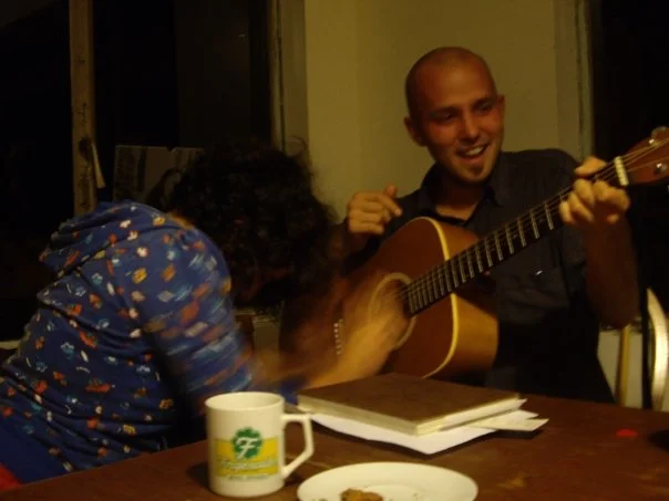 Myself and Leila, she whose privates I punched (in jest). I had cut my cast off a few days before this, so I still had a skinny chicken arm, and it was easier to have others strum while I chorded. Can't stop the jams.