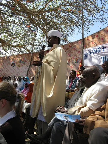 Priest speaking up 2009.jpg