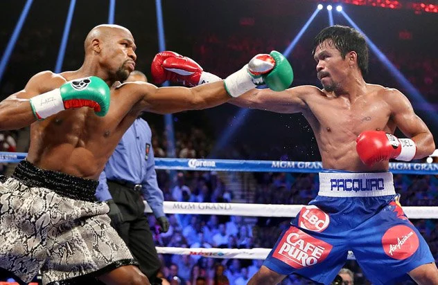 Manny Pacquiao Says Floyd Mayweather Is Scared of Him 