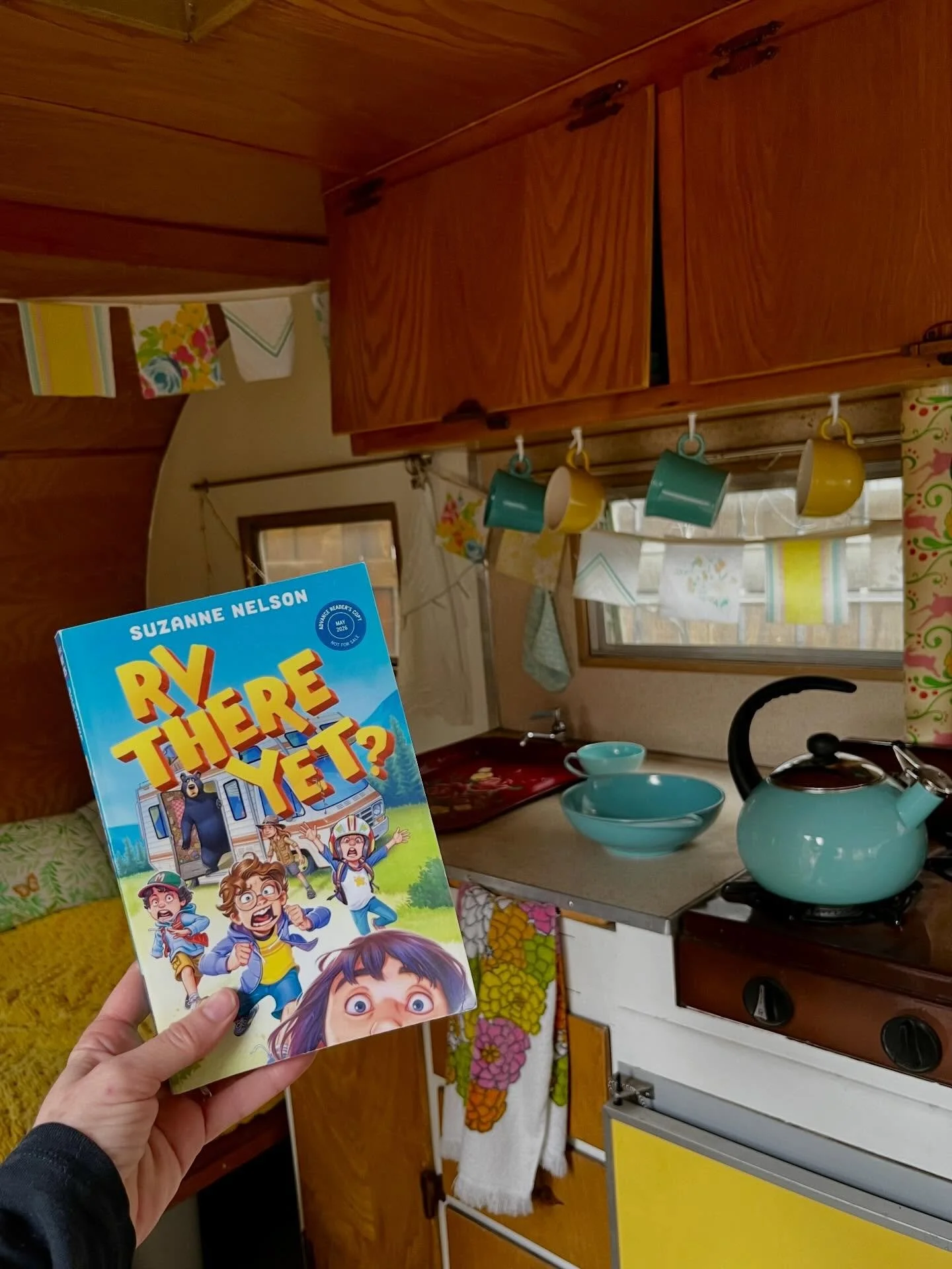 I just finished Suzanne Nelson's fabulous new middle book, *RV There Yet?*, coming on May 12. I loved it!!! 🎉 Swipe through to see her book posing for a photo shoot in my own camper, Peachy! 🩵🍑📖 Here's my review:

I adored this heart-warming and 