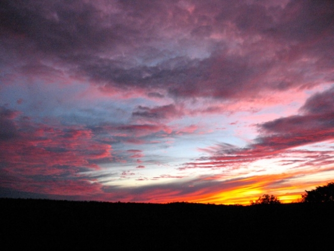 An evening view from the bay window of the Sunset Room