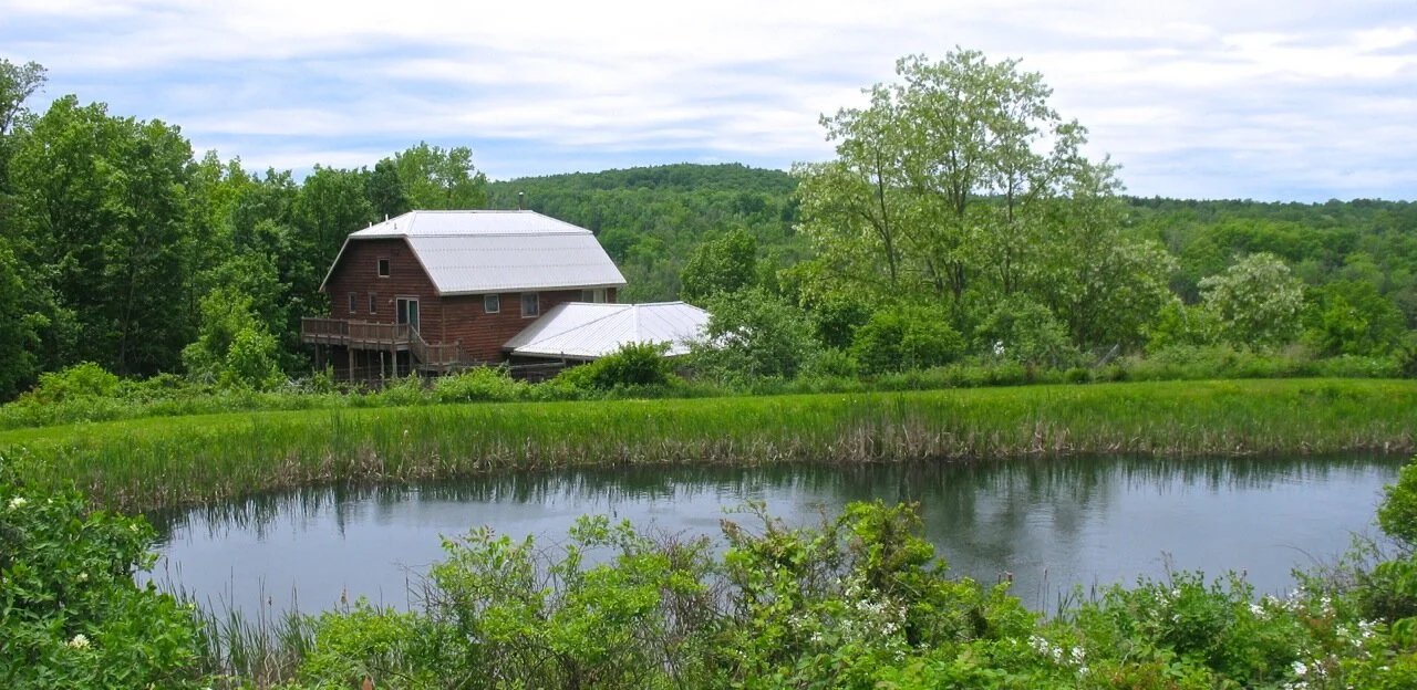 Your home away from home in late spring, with the pond in the foreground and Durfee Hill in the background